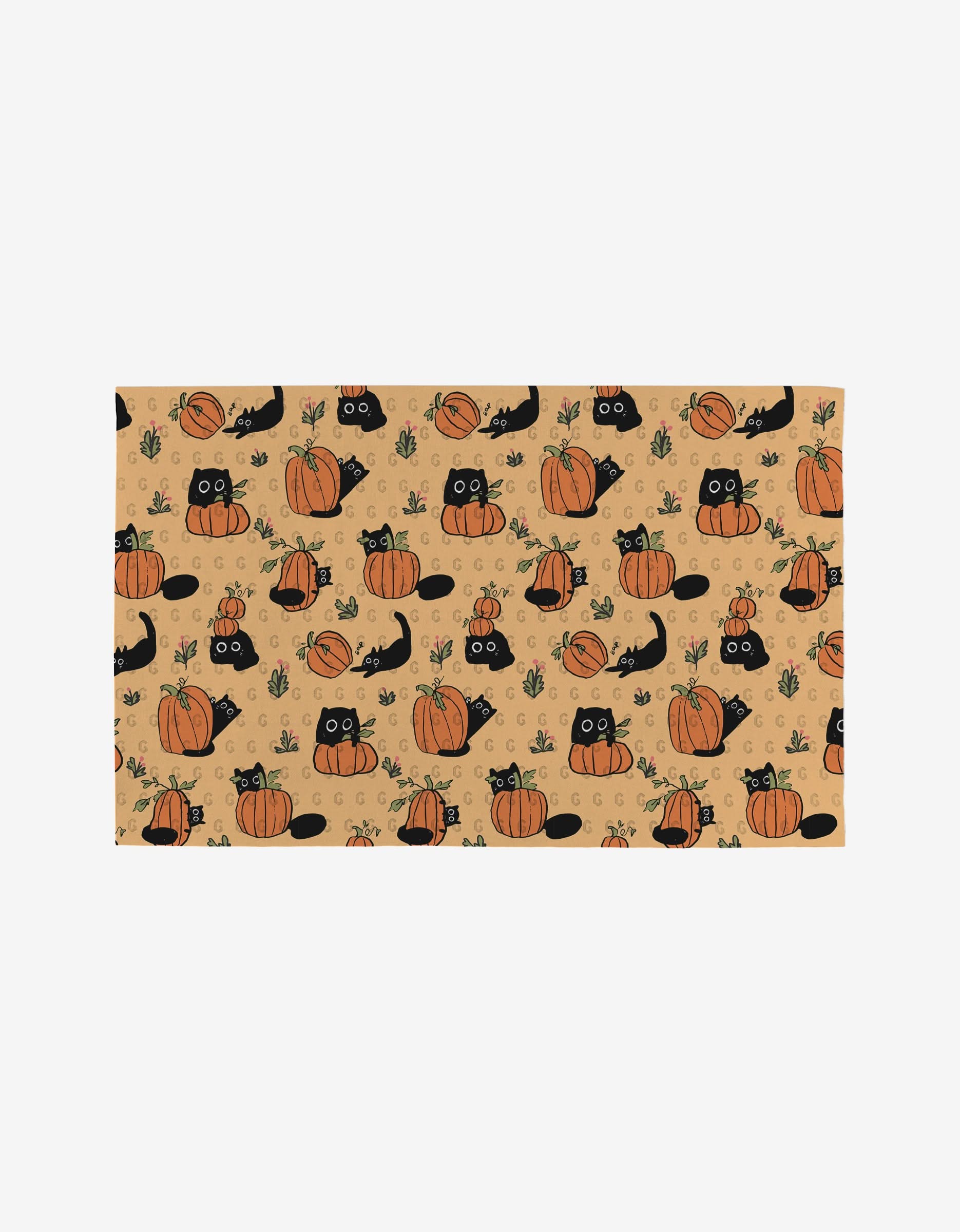 The Black Cats mat by Janna Sue Design features beige rectangles with black cats, orange pumpkins, and green leaves. Cute and autumn-inspired, it’s eco-friendly—crafted from post-consumer recycled materials, not paper towels.