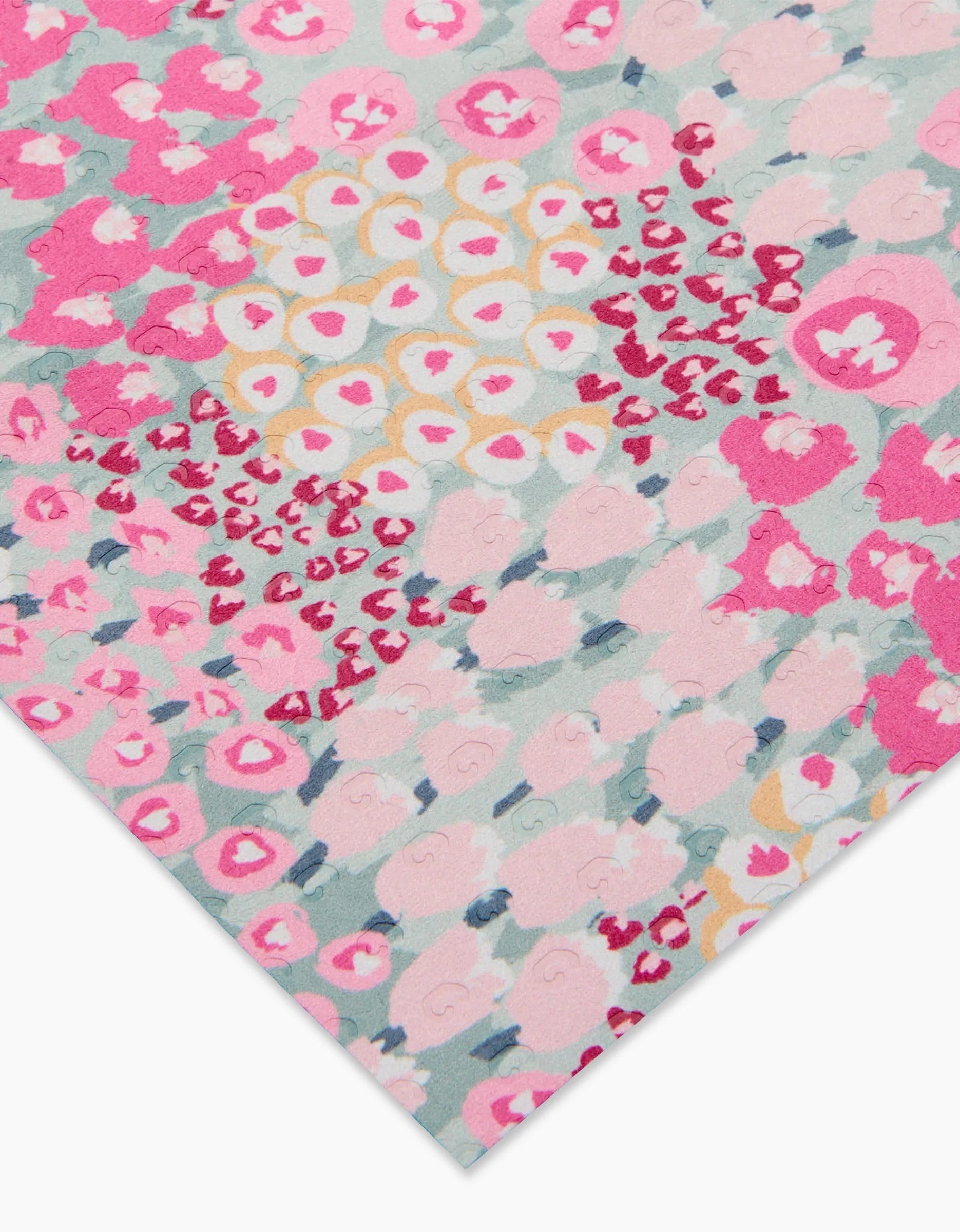 A close-up of Bloomed For Spring by Hufton Studio shows vibrant pink, red, yellow, and teal abstract floral and circular patterns. Made with post-consumer recycled materials, this eco-friendly fabric pops against a white background.