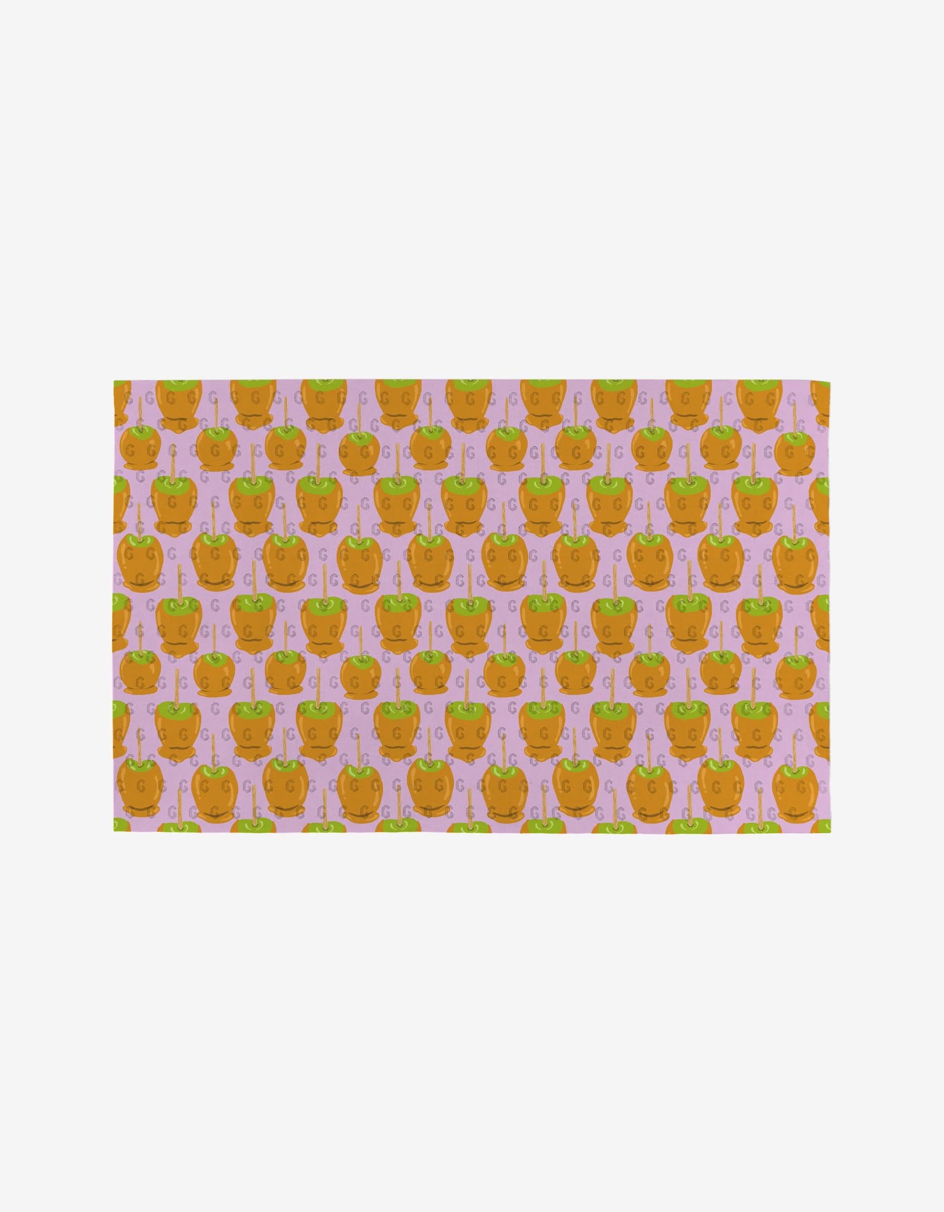 The Caramel Apple by Elisabeth Wing is a rectangular cloth with orange cat faces sporting green eyes on a light pink background. Made from eco-friendly materials, its an ideal Not Paper Towels alternative.