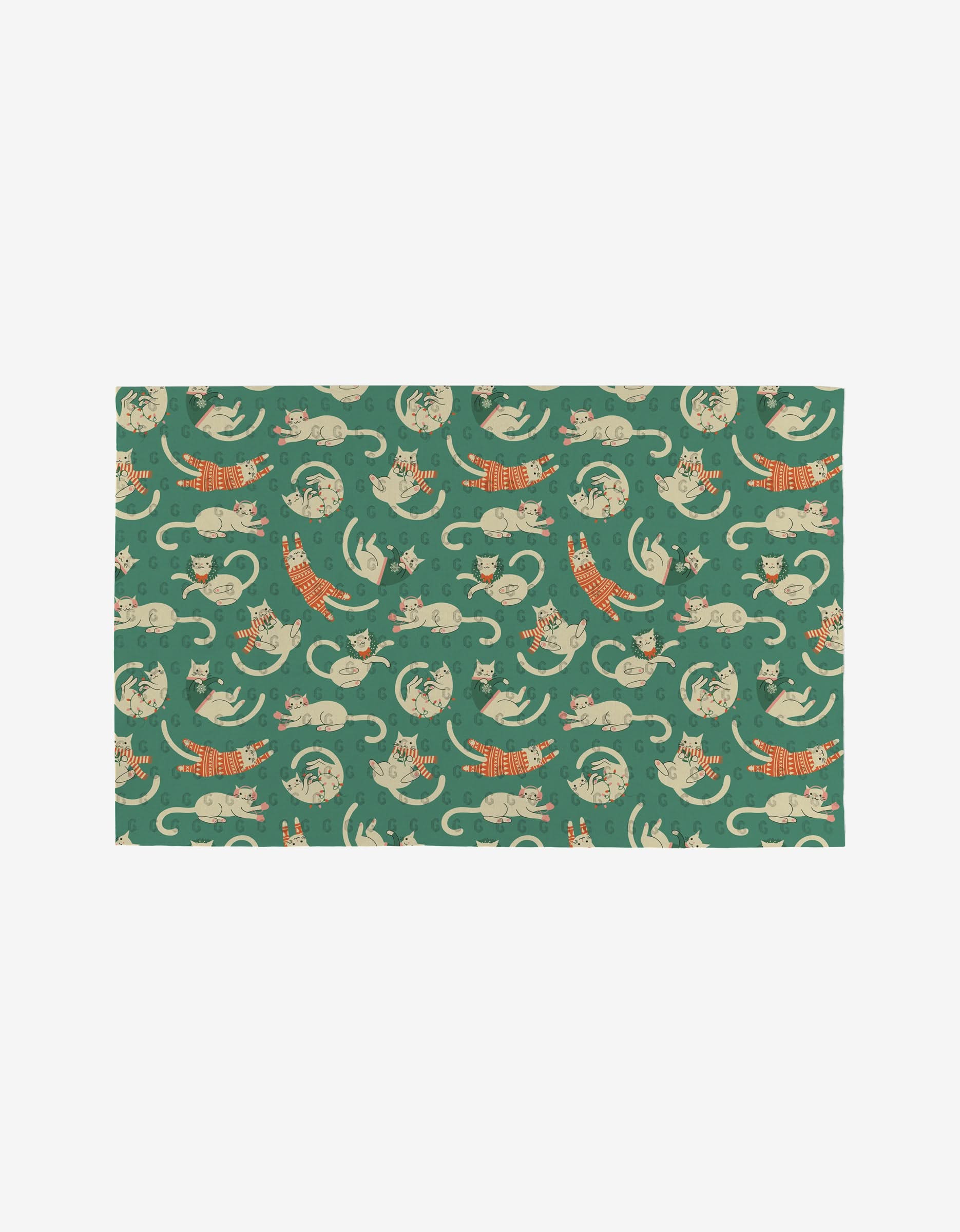 The Christmas Cats mat by Megan Kampa is a green rectangular rug featuring playful, colorful cats and is made from eco-friendly post-consumer recycled materials.