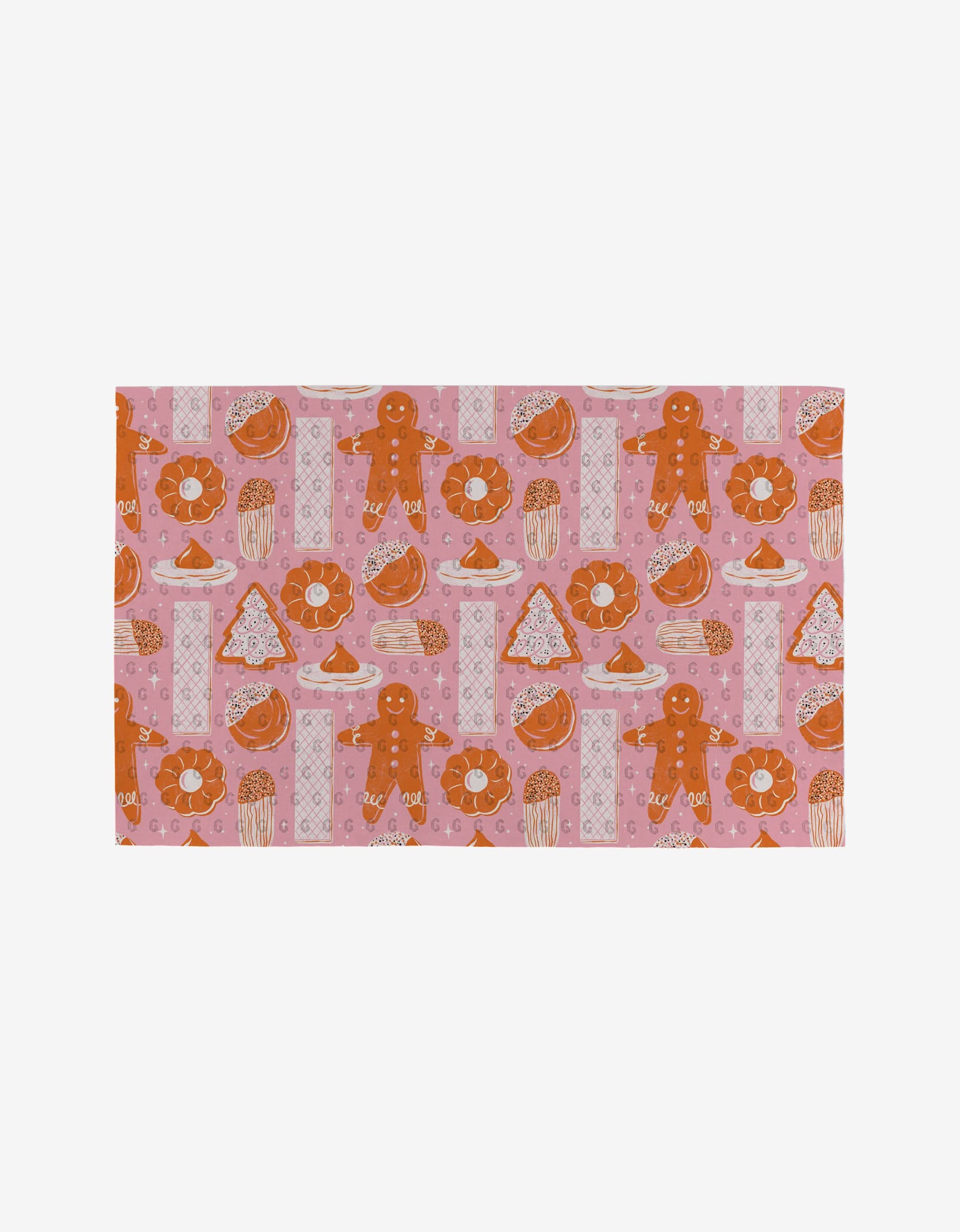 The Christmas Cookies mat by Megan Roy features a pink background with repeating gingerbread men, donuts, cupcakes, candy canes, and iced cookies in orange, white, and red—an eco-friendly alternative to Not Paper Towels.