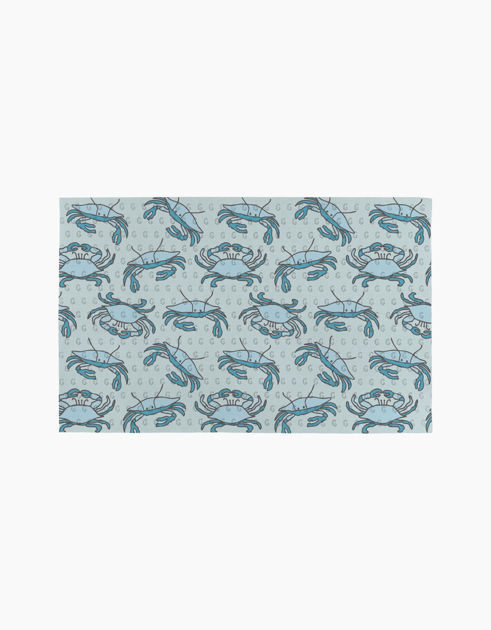 The Mindfulnice Coastal Crew mat features a repeating blue crab and bubble pattern on light gray, inspired by eco-friendly paper towels.