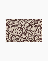 Coffee Reverie by Gerdadzy features an abstract floral pattern with cream flowers and swirls on a brown backdrop—ideal for stylish, eco-friendly kitchen towels or as a recycled paper towel alternative.