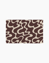 Coffee Reverie by Gerdadzy features a wavy, intertwined brown and beige abstract pattern with small polka dots—ideal for stylish, reusable paper towels as an eco-friendly alternative to disposable kitchen towels.
