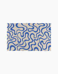 Coffee Reverie by Gerdadzy features a winding blue maze pattern on beige, accented with light gray “G” circles. This eco-friendly kitchen towel brings stylish flair as a recycled paper towel alternative.
