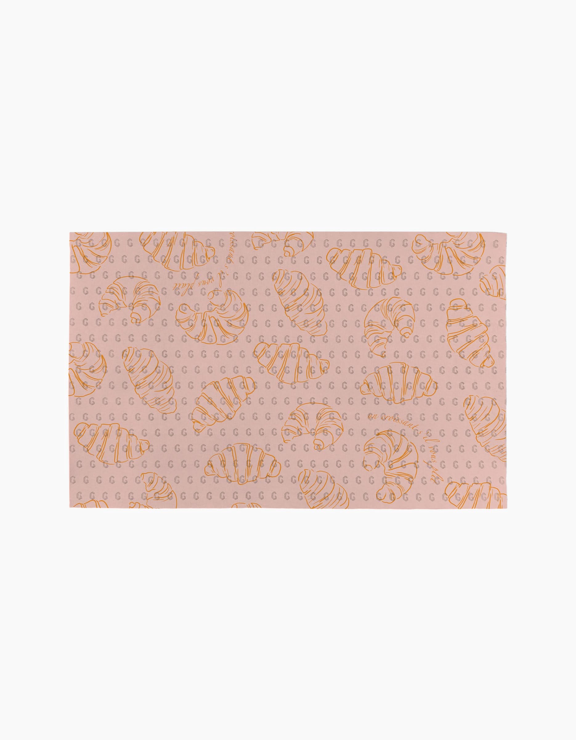 Introducing Croissant Crush by Geometry: a rectangular pink mat featuring orange croissants and repeating G letters on a light background, crafted from eco-friendly materials for a stylish, responsible update to your space.