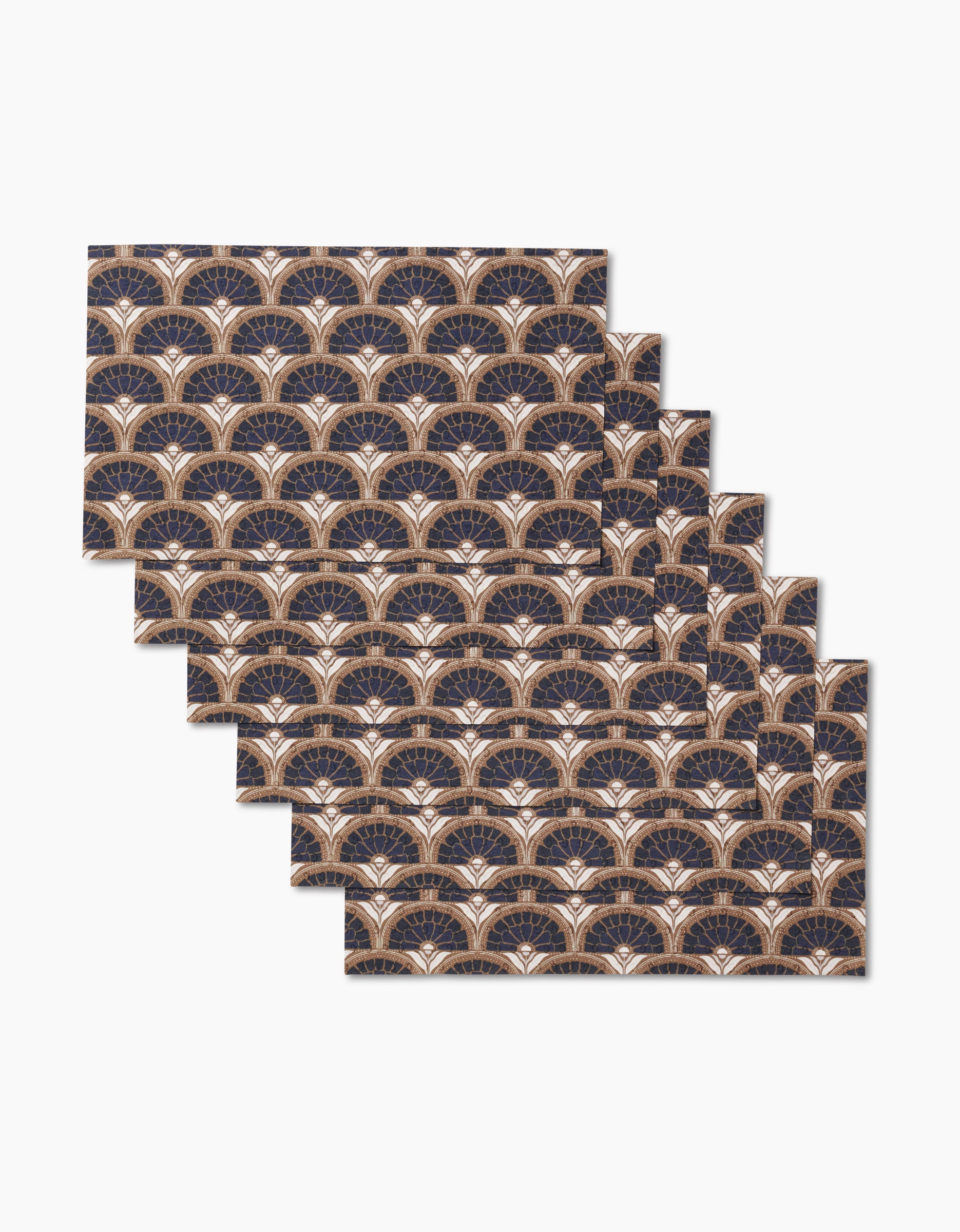 Six Eliza rectangular placemats by Amy MacCready, featuring an art deco fan print in navy, gold, and white, offer a stylish and eco-friendly alternative to paper towels for elegant, sustainable dining.
