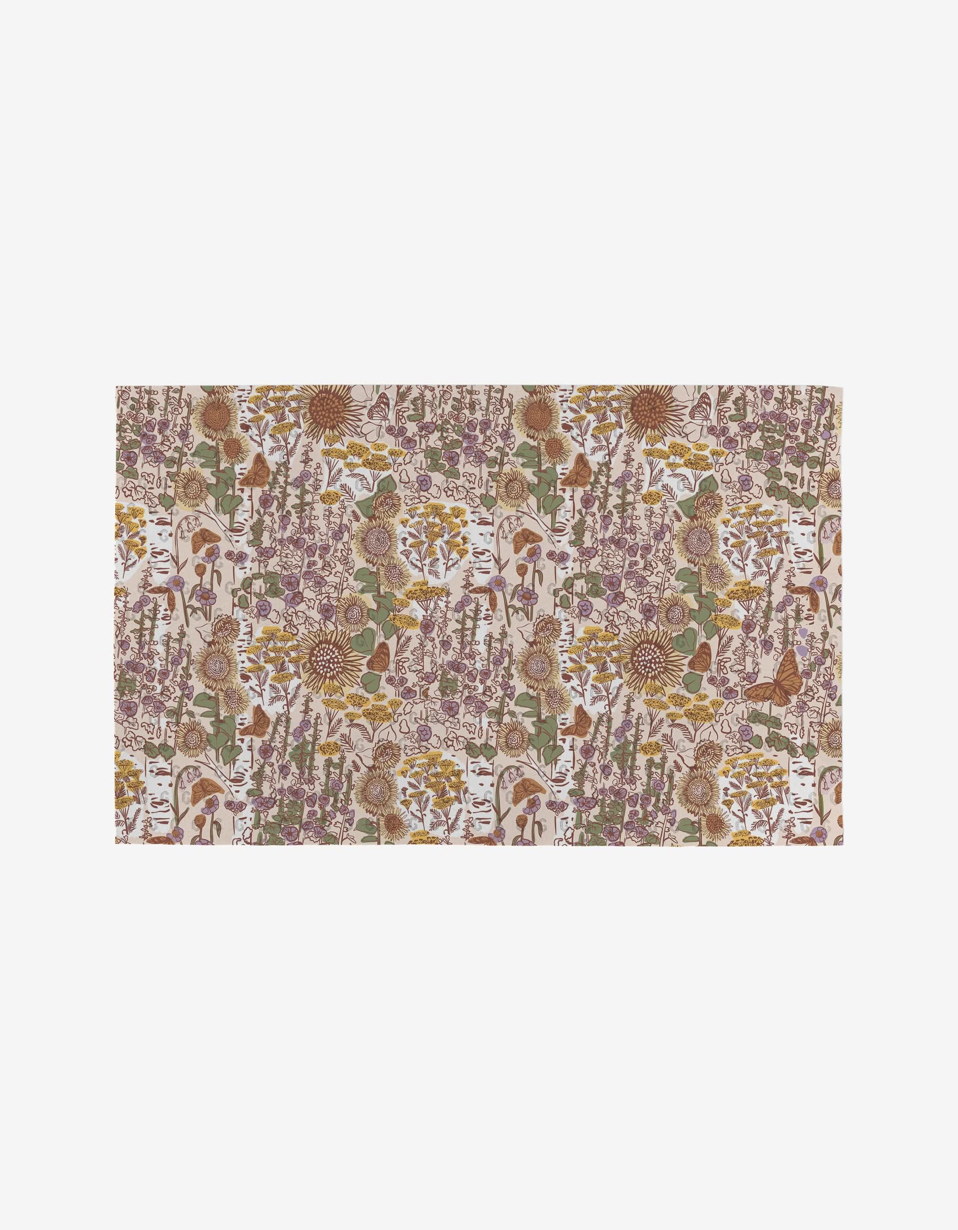 Elisabeth Wing’s Fall Forest is a rectangular fabric with a floral and botanical print in brown, green, gold, and purple on white. Made from recycled materials, it’s an eco-friendly alternative to Not Paper Towels.