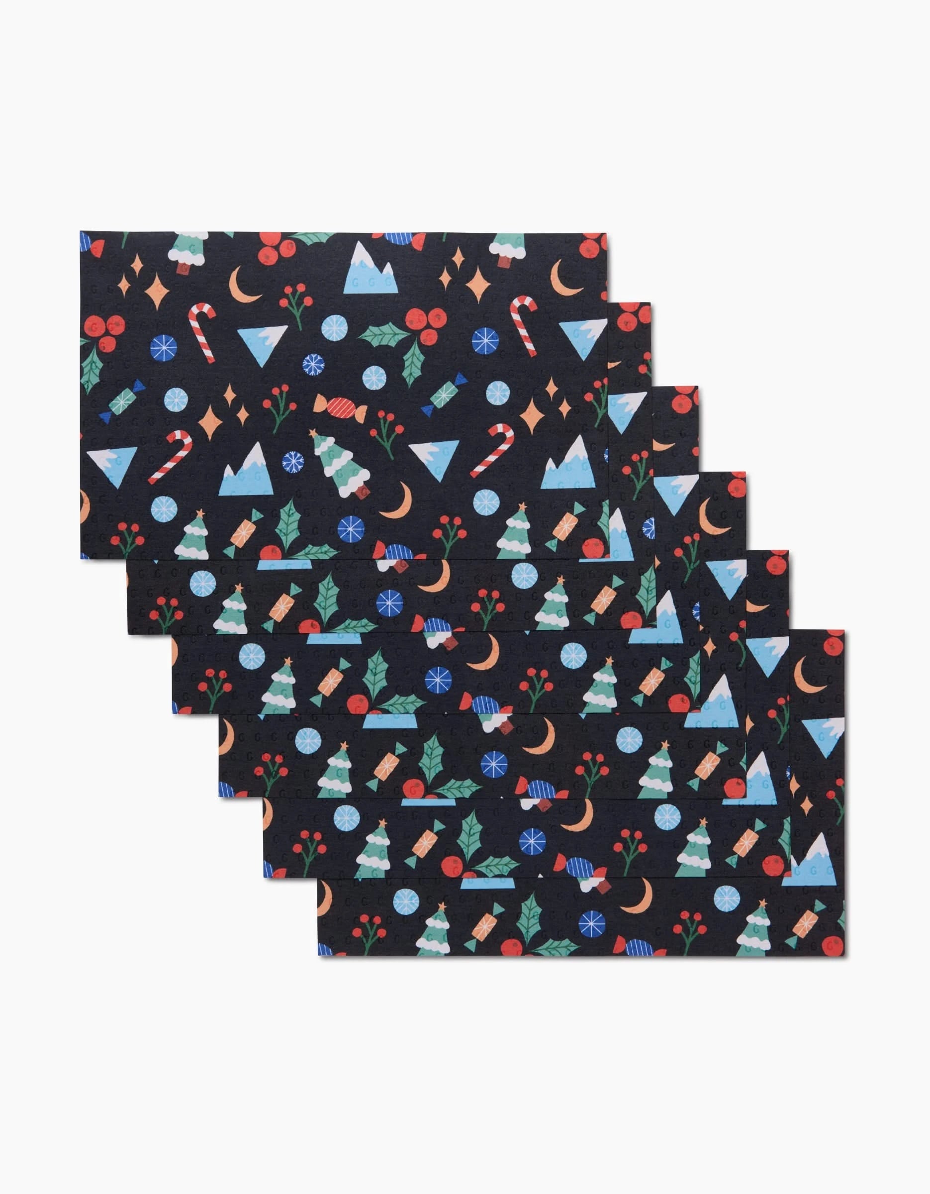 Claire Iglesias Festive Christmas offers five dark-hued rectangular reusable paper towels with a winter pattern—snowflakes, mittens, holly, mountains, trees, candy canes, and ornaments in red, blue, green & white. Machine washable; overlaps diagonally.