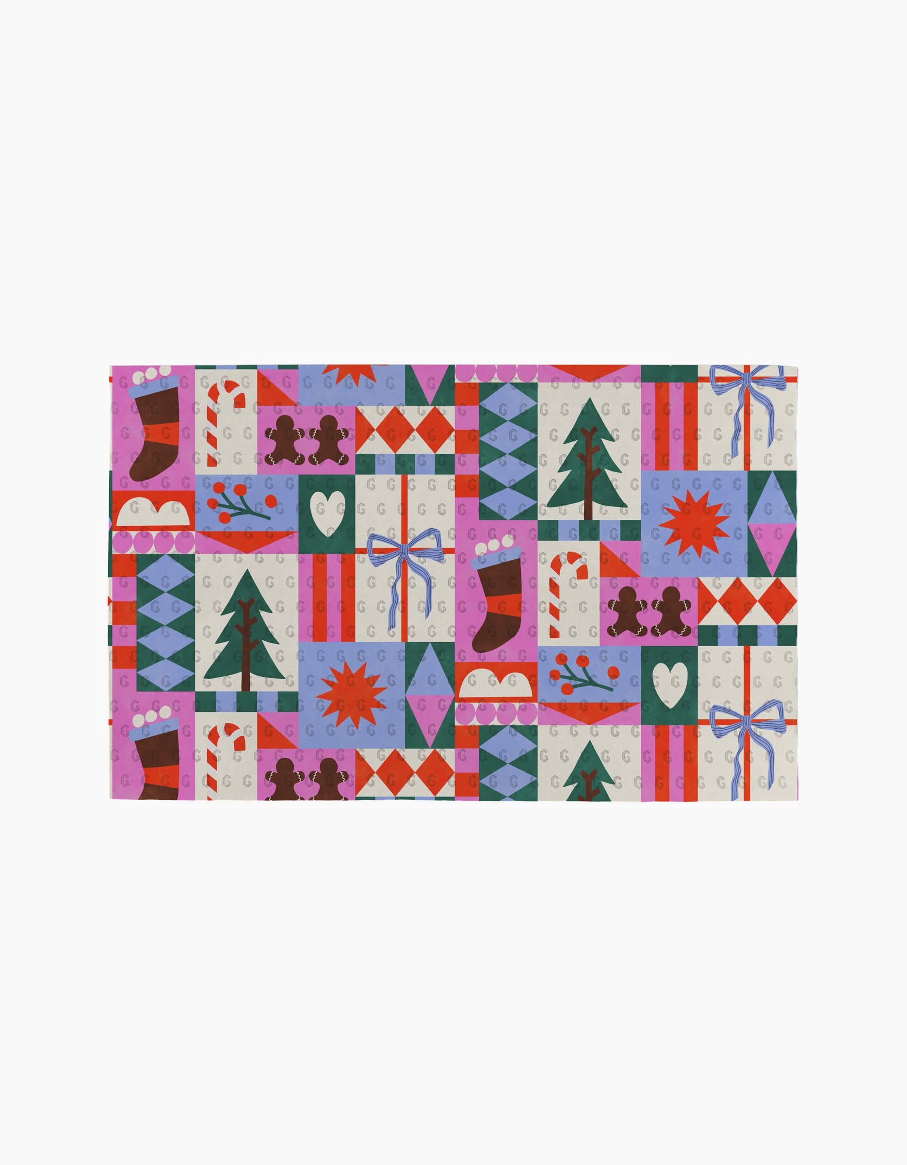 The Festive Christmas Quilt by Claire Iglesias is a rectangular, reusable towel featuring a colorful holiday pattern with Christmas trees, stockings, gingerbread people, candy canes, stars, gifts, hearts, and geometric shapes.