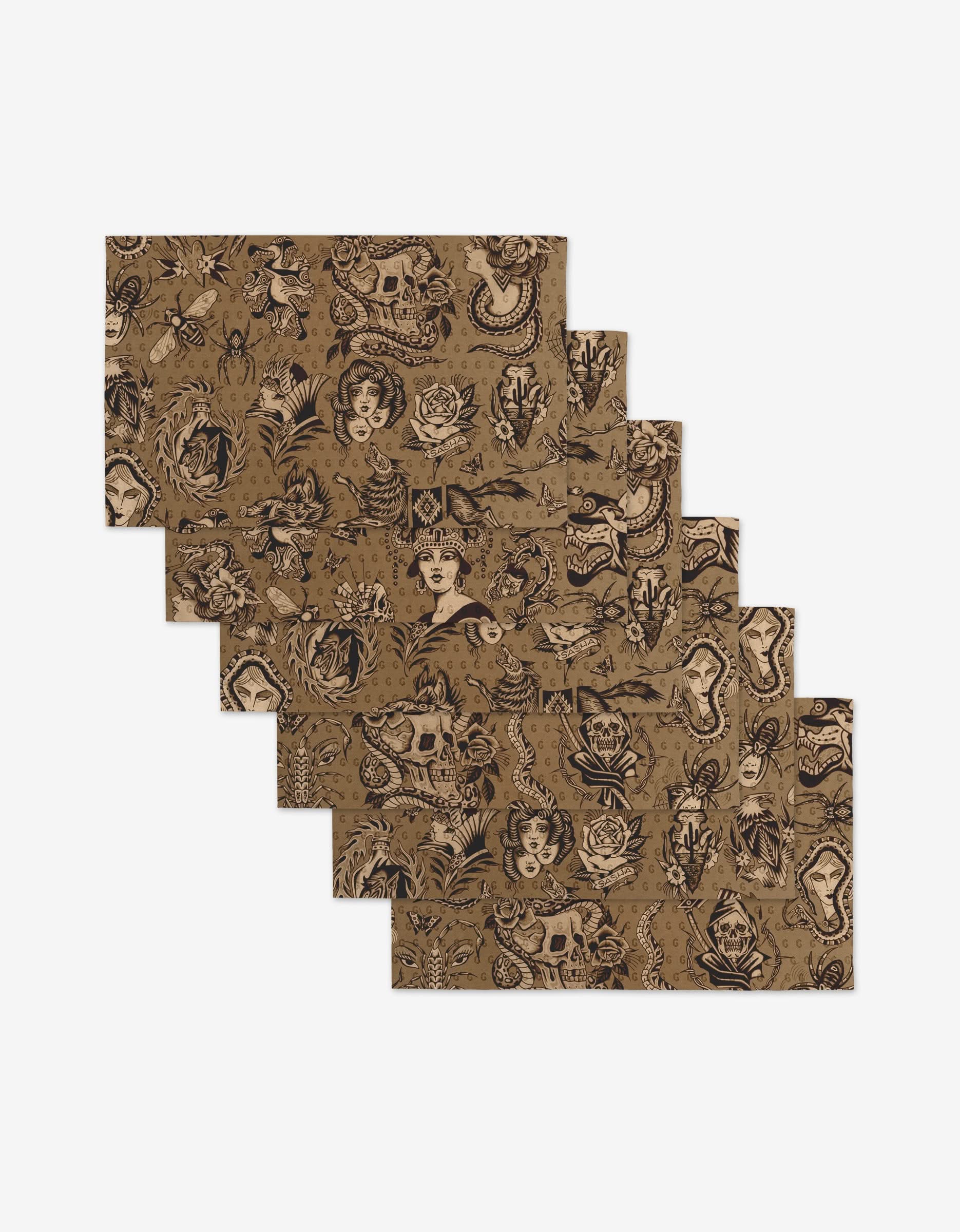 Flash by Cole Strem: Set of six brown rectangular placemats featuring black tattoo-style art—skulls, snakes, flowers, and more. Reusable and eco-friendly for edgy table settings; a stylish alternative to paper towels.