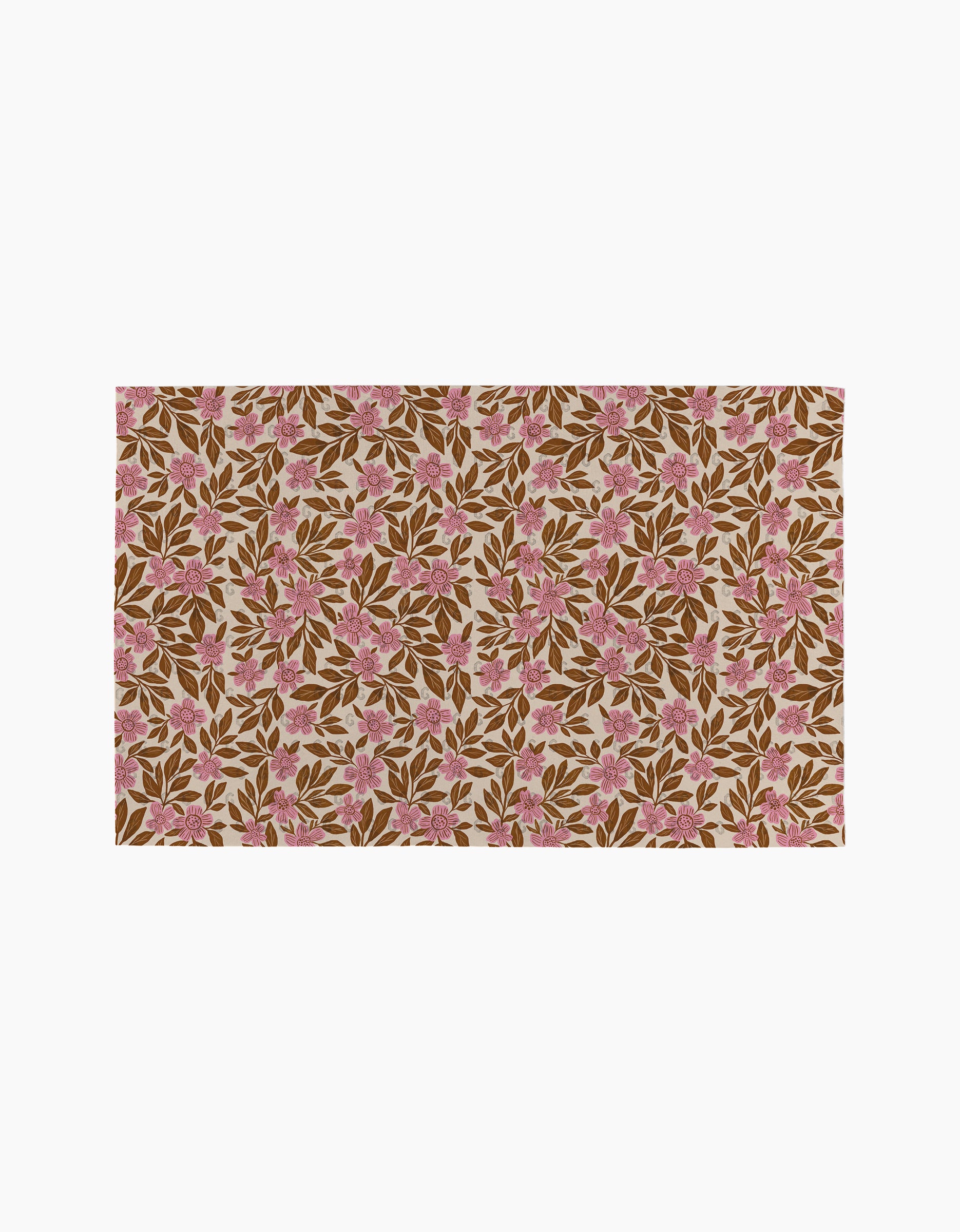 The "Floral Meadow" mat by Lisa Nelson features pink flowers and brown leaves on a light beige background, inspired by the soft look of eco-friendly paper towels.