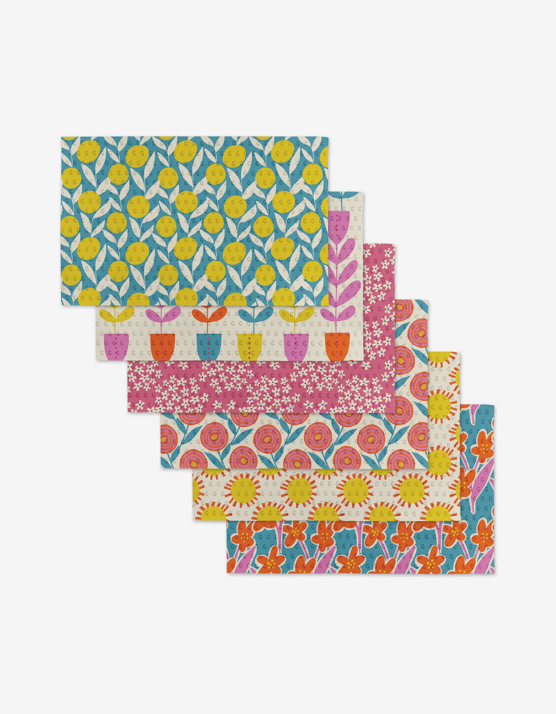 Six rectangular Lizzie Clark Flower Parade dishcloths, featuring vibrant floral and plant patterns, are fanned out on a white background—a colorful, eco-friendly alternative to Not Paper Towels.