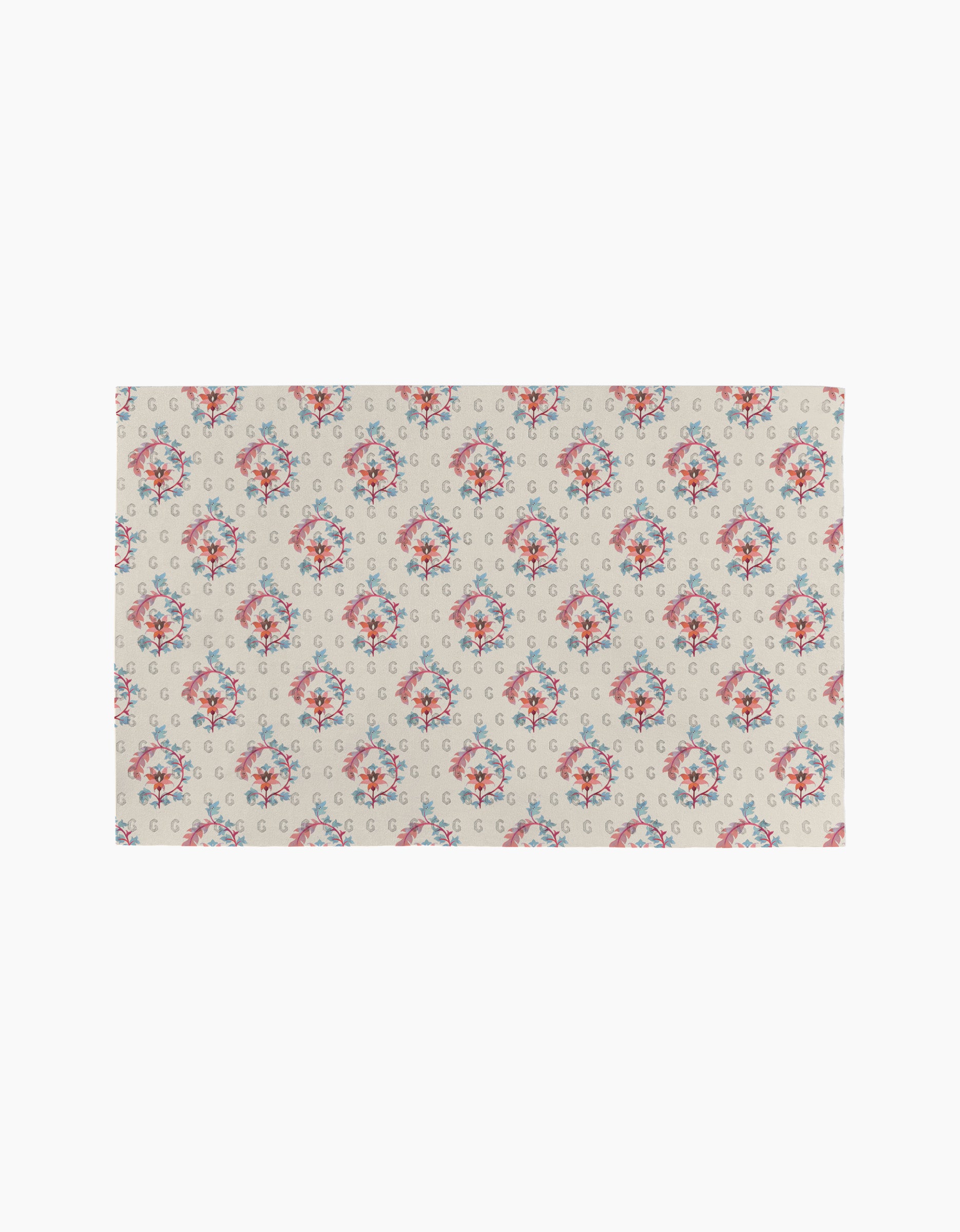 The Folk Medallion by Maayan Alper-Swan is a rectangular beige scarf with pink and blue floral bouquets and blue double G logos, inspired by reusable paper towels and designed as an eco-friendly accessory.