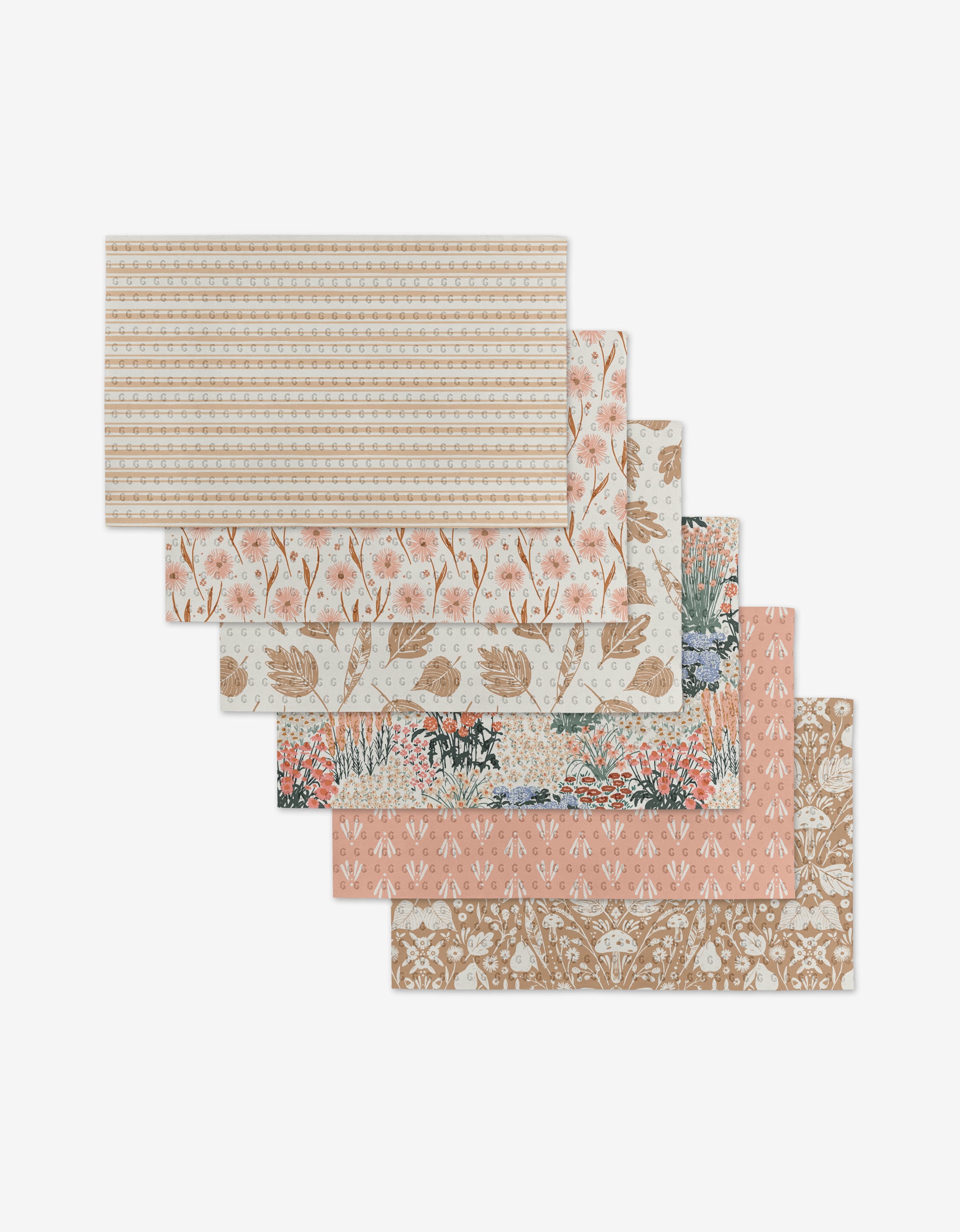 Garden Bloom by Hufton Studio features five rectangular, eco-friendly papers made from recycled materials, showcasing pastel patterns—stripes, flowers, leaves, and botanicals—arranged in an overlapping fan shape.