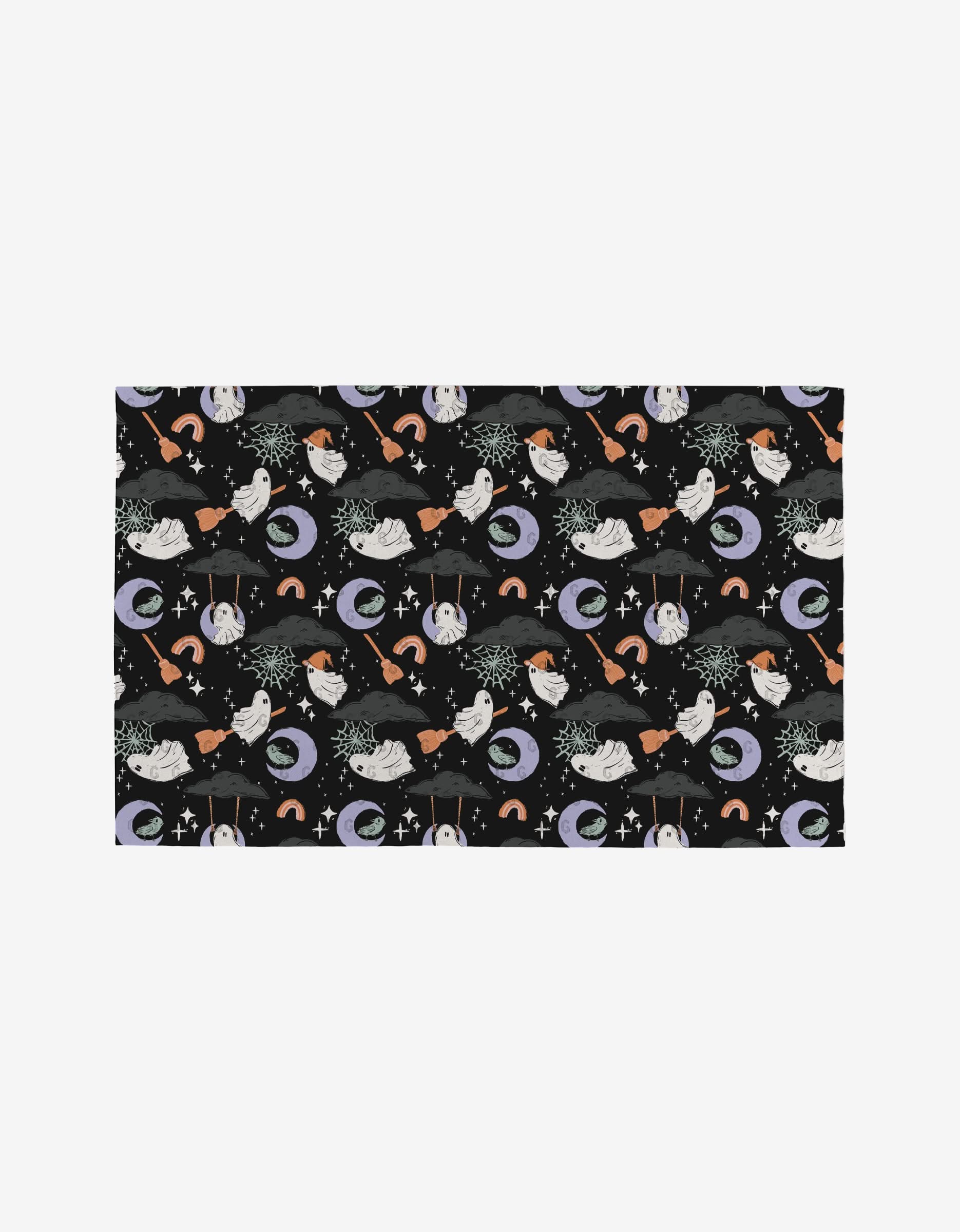 The Ghosts In The Night pattern by Charlie Rowan Designs features a mystical Halloween theme with black cats, cauldrons, witch hats, and more—perfect for reusable and eco-friendly Not Paper Towels.