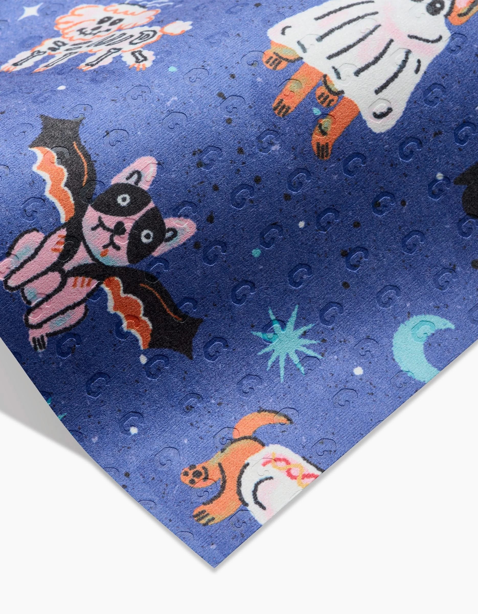 Halloween Hounds by Camila Leão is a blue fabric with whimsical animals in space-themed costumes—like cats with bat wings and pets as astronauts—on a starry backdrop, perfect for making reusable paper towels from post-consumer recycled materials.