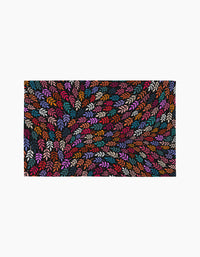 Jewel Leaf Swirl by Rachel Parker showcases densely packed, colorful leaf-like shapes in red, orange, purple, pink, and white on black, creating a swirling, vibrant pattern reminiscent of eco-friendly paper towels.