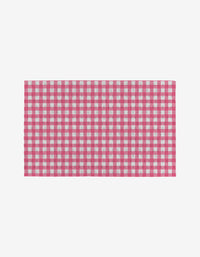 The Lemon Pop mat by Ashley Celena features a red and white checkered pattern, offering an eco-friendly and reusable alternative to disposable paper towels, perfect for your home and centered on a clean white background.