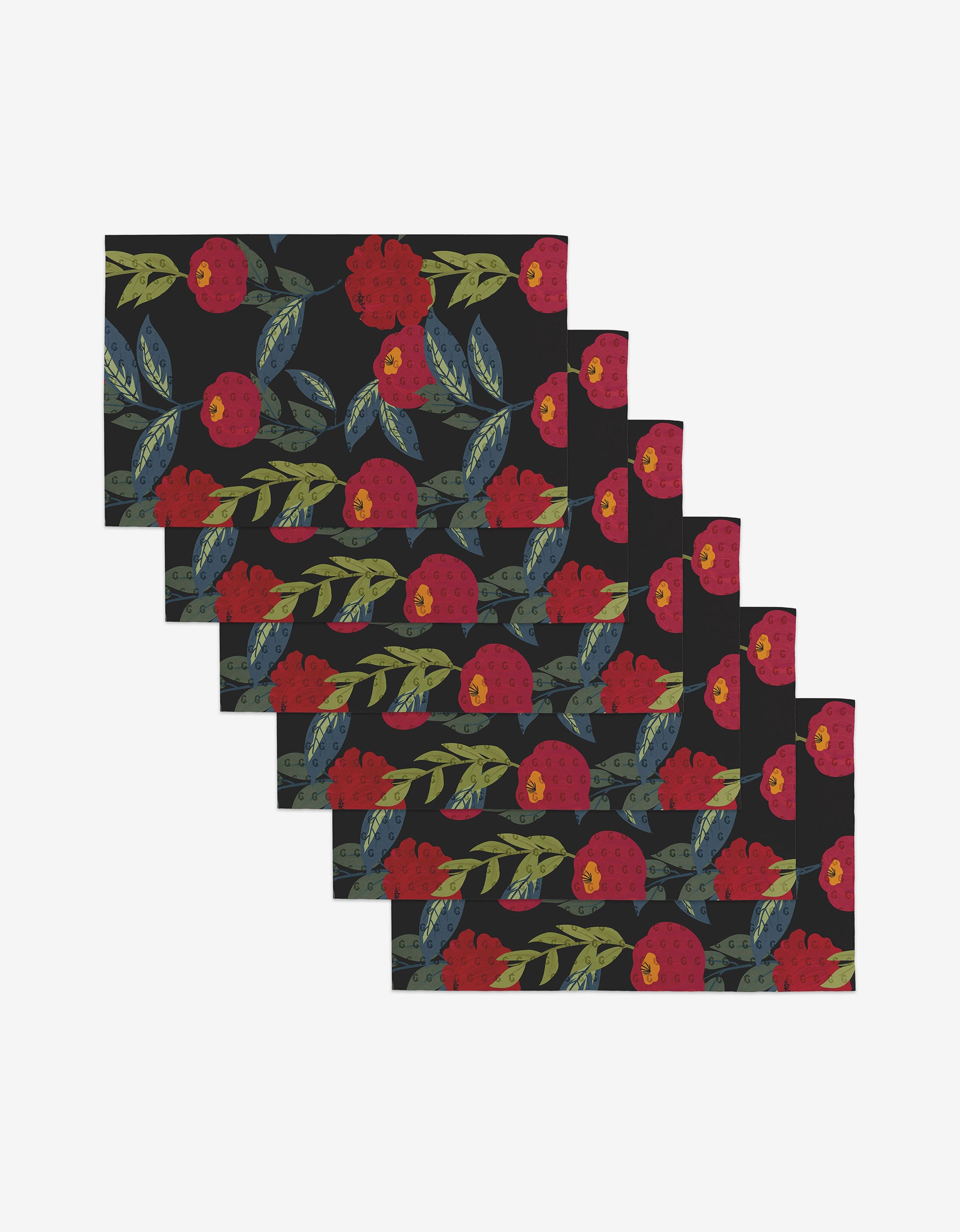 The GEOMETRY Lovely Night set includes six rectangular, reusable placemats with a black background and a red floral and green leaf pattern—an eco-friendly alternative to paper towels.