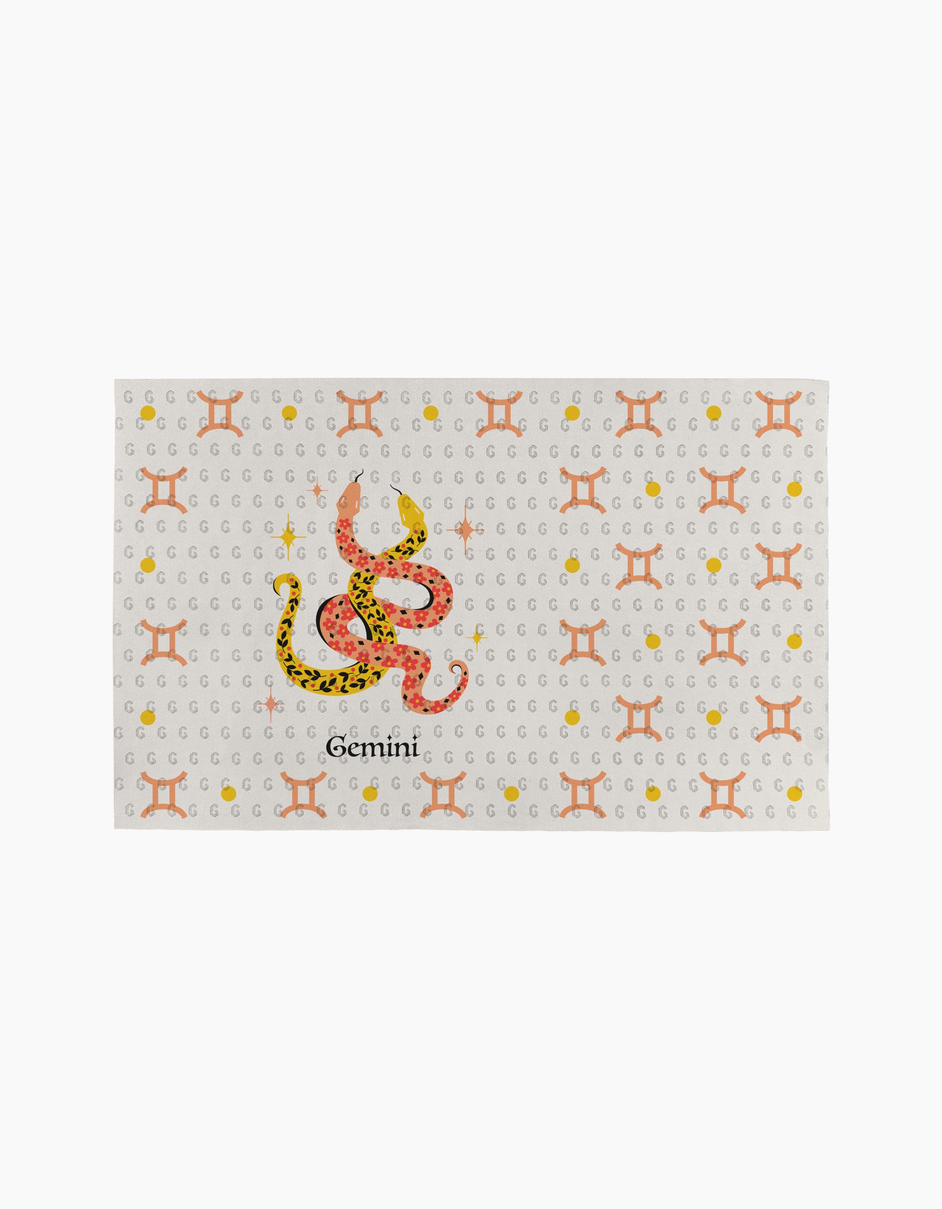 The Lucky Gemini mat by Heather Zhou features a colorful Om symbol and “Gemini” in black on a white background, with orange Gemini zodiac symbols and yellow dots, crafted to resemble eco-friendly paper towels.