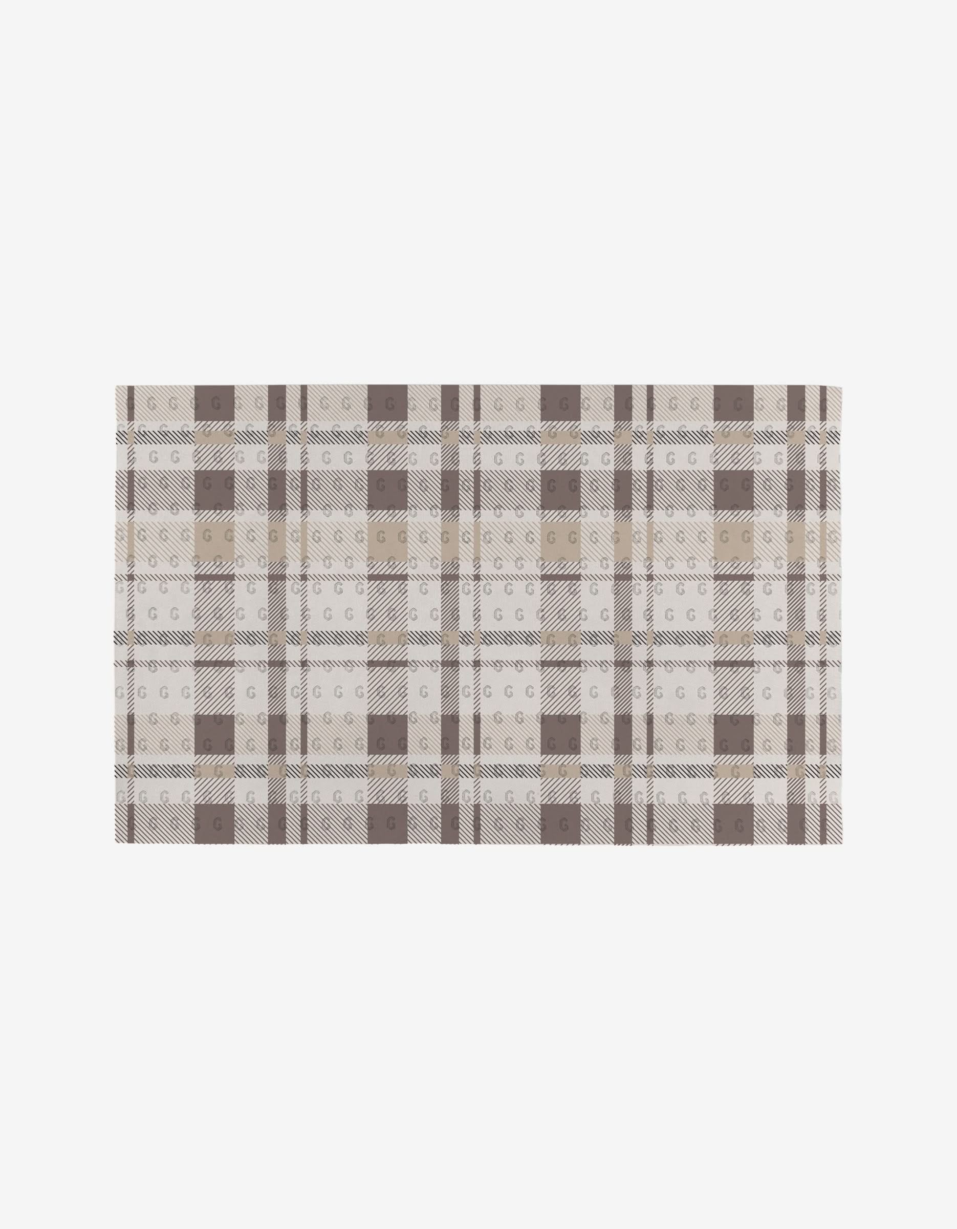 The Minimal Christmas Trees rug by Rosa Kichline features a beige, brown, and cream plaid pattern with small G letters in each square, crafted from eco-friendly materials for a sustainable touch.