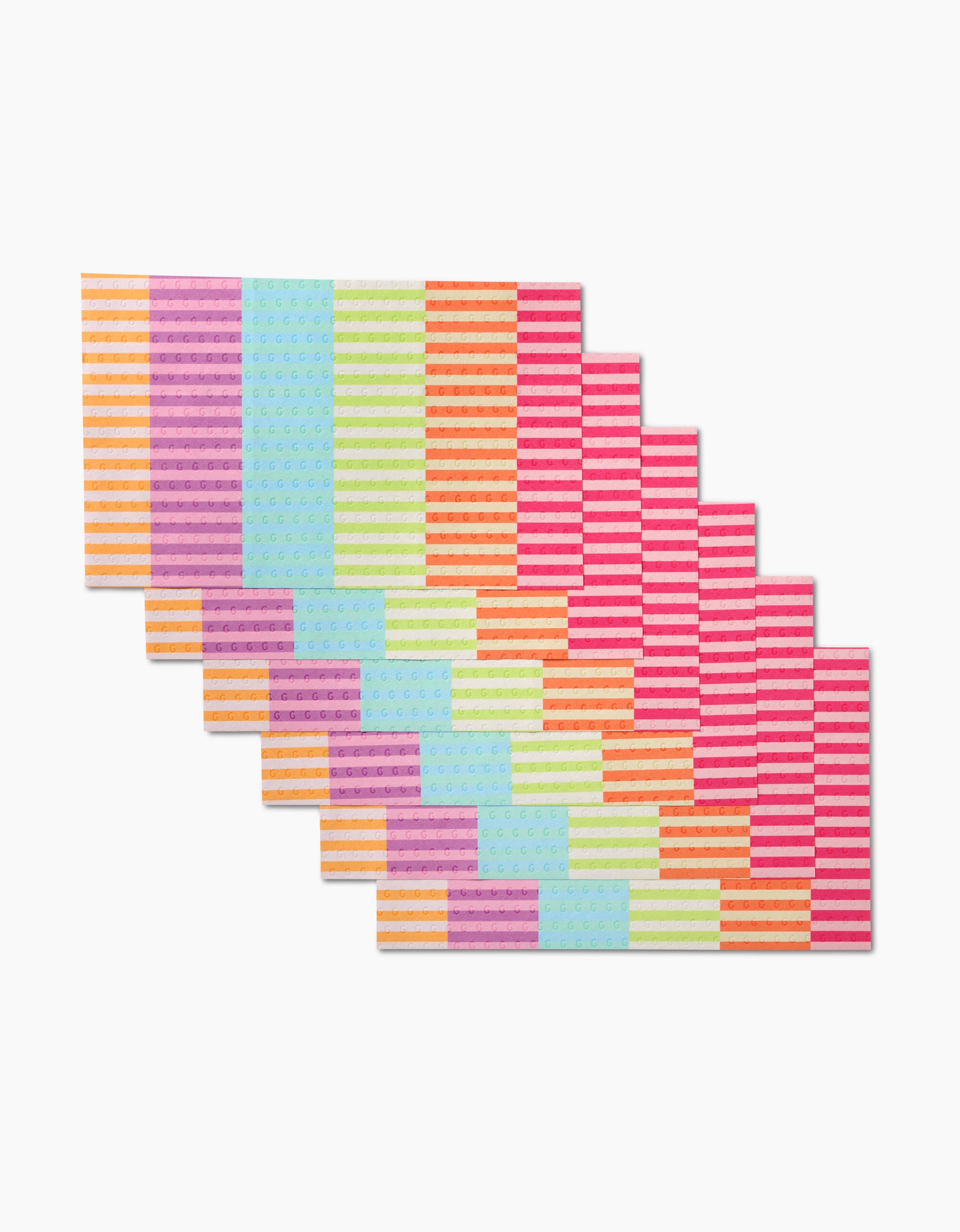 Ten GEOMETRY Neon Nights envelopes are fanned on a white background, featuring environmentally friendly paper and bold horizontal stripes in pink, orange, green, blue, and purple.