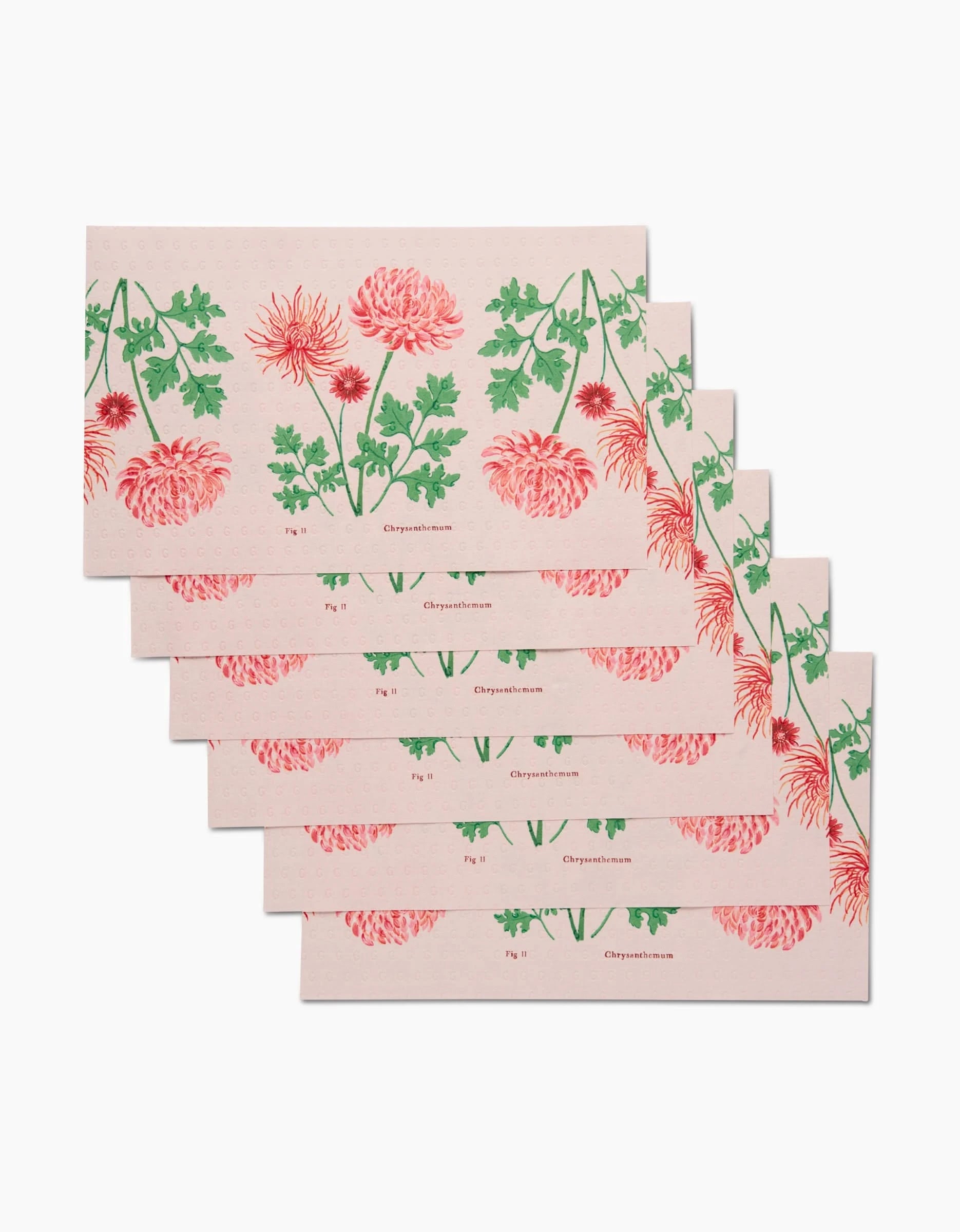 Six rectangular November Chrysanthemum cards by Linda Fox, featuring pink and red chrysanthemum flowers with green leaves on a light pink background, are made from eco-friendly post-consumer recycled materials.