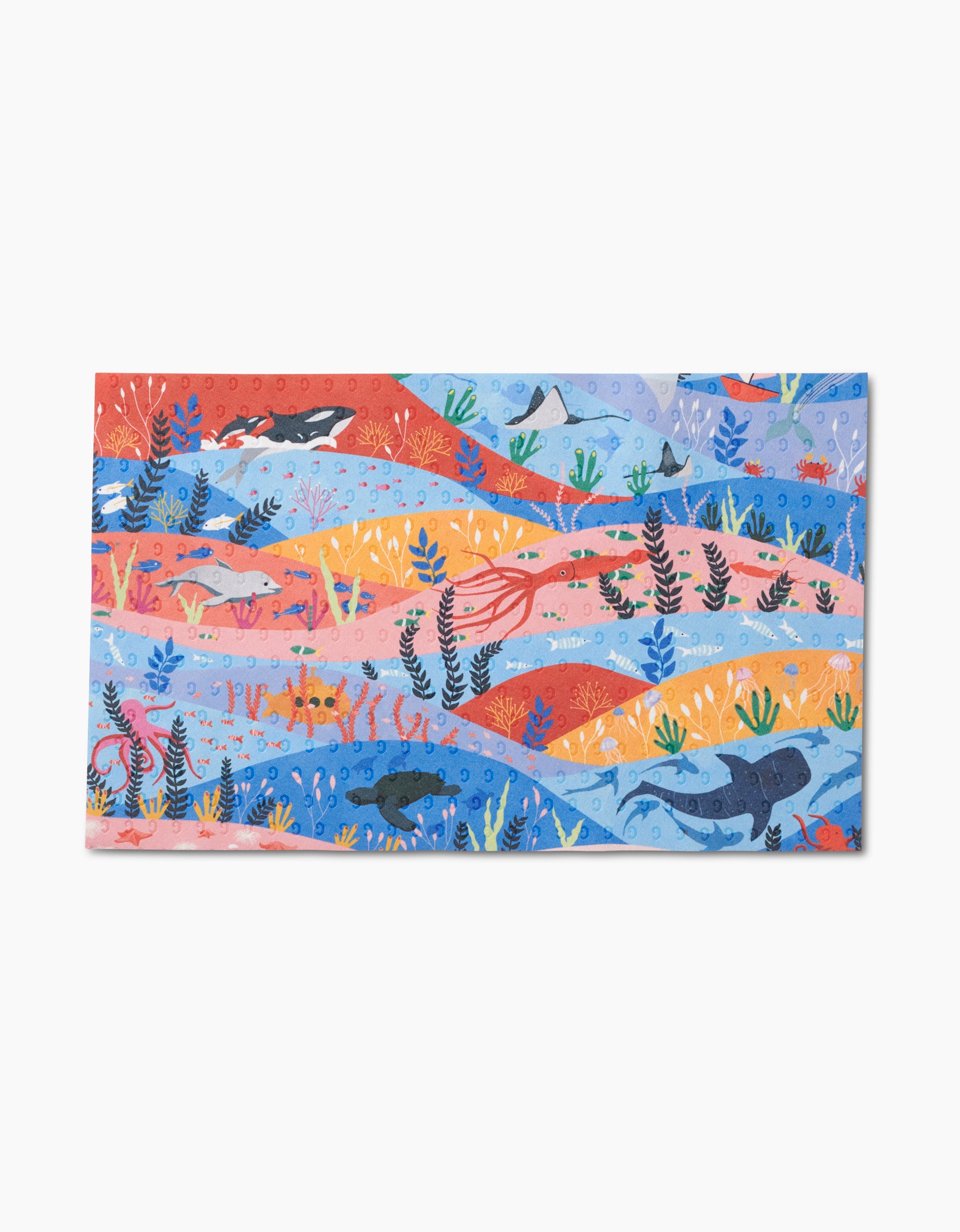 Oceans by Ceyda Alasar features a vibrant underwater illustration with sharks, fish, sea plants, coral, and an octopus on eco-friendly reusable paper towels made from post-consumer recycled materials.