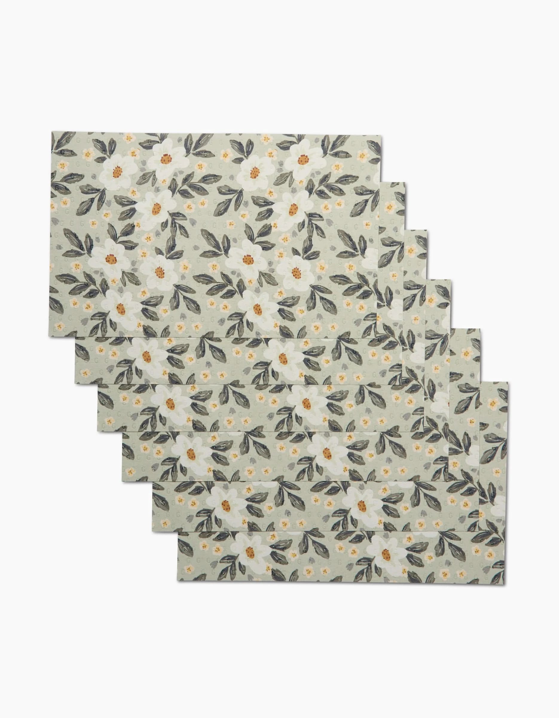 Six Painted Spring Flowers napkins by Teri the Butter, featuring a floral design with white flowers, yellow centers, and green leaves on a light background—an eco-friendly alternative to reusable paper towels.