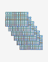Picnic Perfect by Rachel Parker is a digital artwork with six overlapping rectangular grids of blue, orange, white, and teal squares—evoking eco-friendly tiles—arranged in a step-like pattern on a white background.