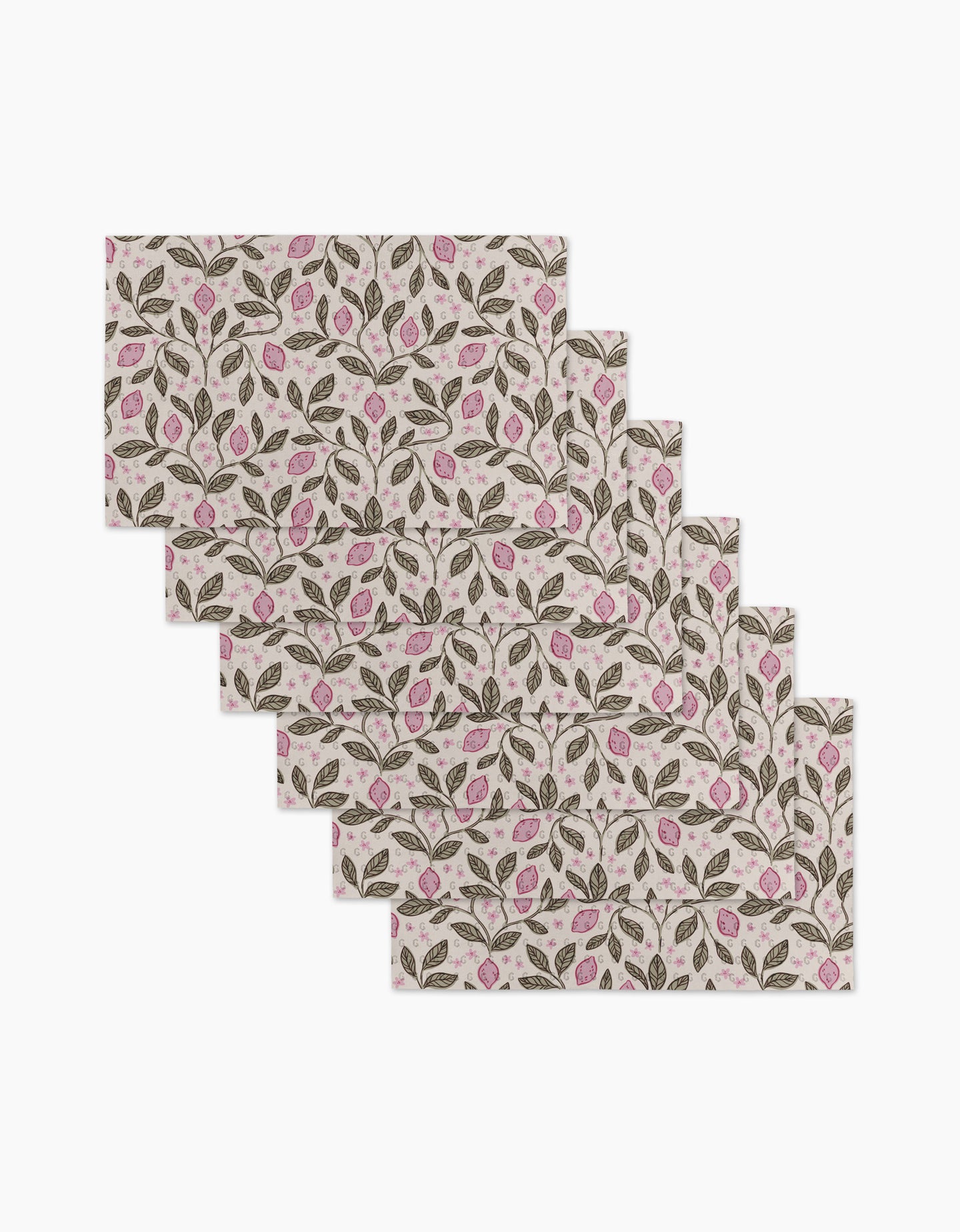 Six rectangular placemats—Pink Summer Lemons by Teri the Butter—feature a repeating pattern of green leaves and pink flowers on a light background, made from eco-friendly kitchen towels for sustainable dining.