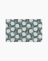 Polka Dot Blooms by Lizzie Clark features a repeating geometric pattern of cream circles with small dots and blue, dark gray crescents on a light background—ideal for pairing with eco-friendly or reusable paper towels.