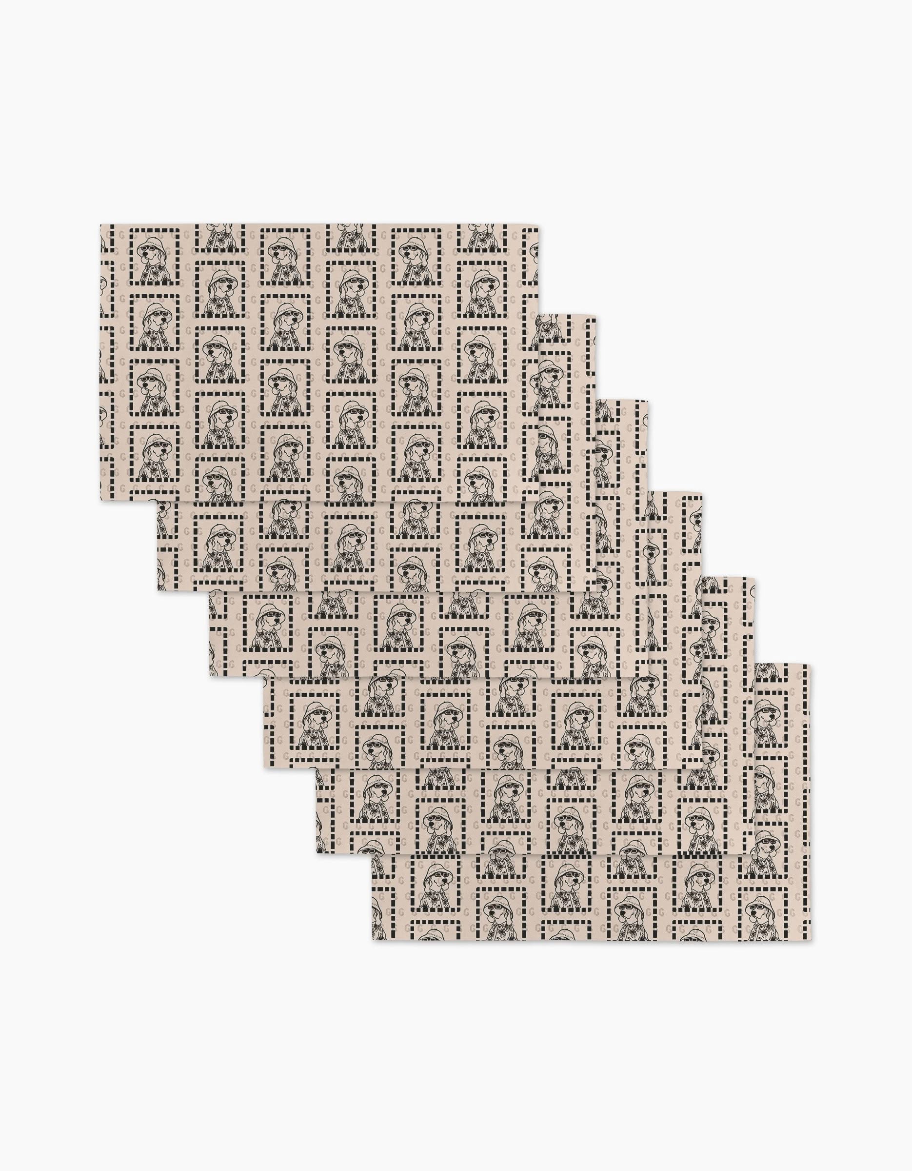 Sheets of Ready For Summer Doggy by Geometry, featuring black and white dog portraits in a staggered pattern—an economical, eco-friendly alternative to Not Paper Towels.