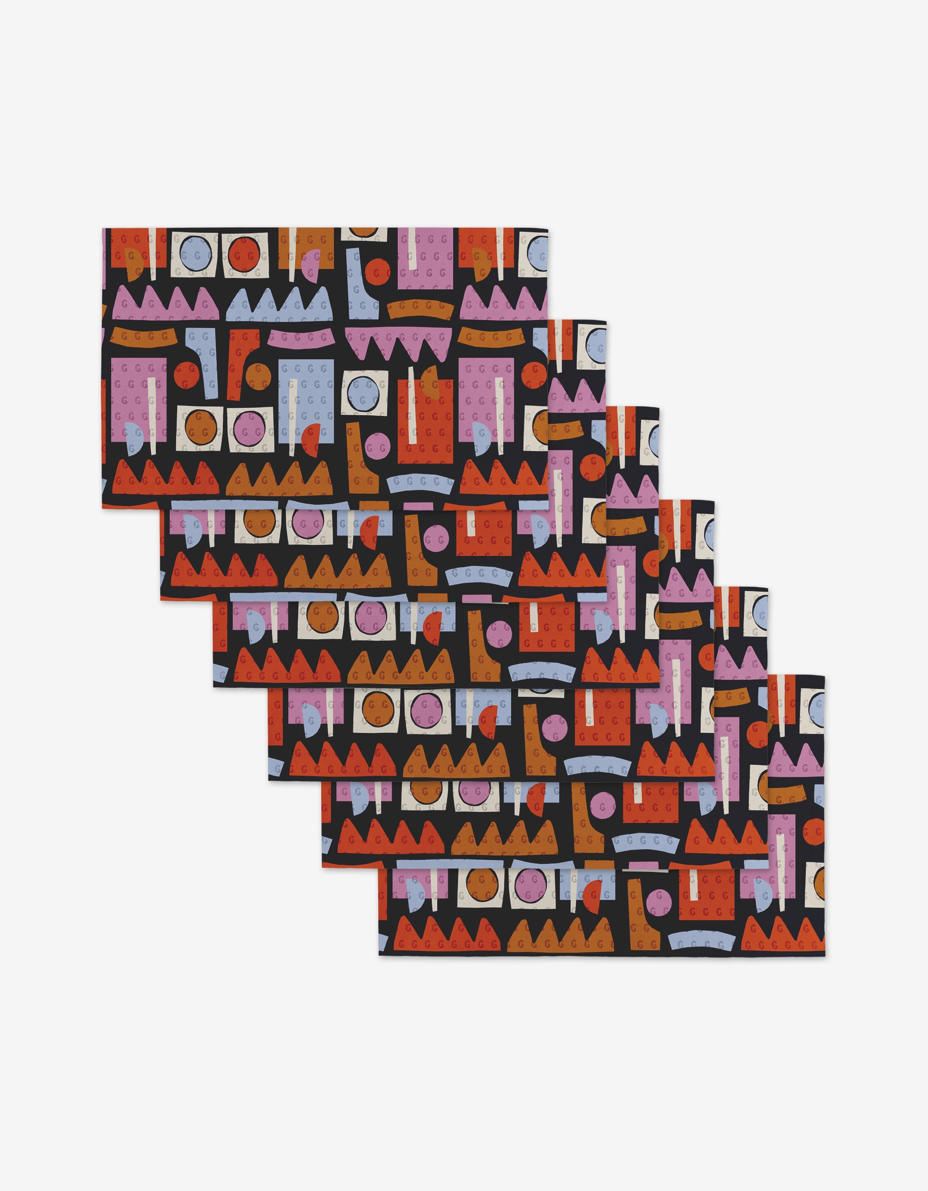 Claire Iglesias’ Retro Shapes Fiesta offers five rectangular placemats made from post-consumer recycled materials, showcasing an abstract geometric design in red, orange, purple, blue, and black. The eco-friendly set comes stacked and fanned out.
