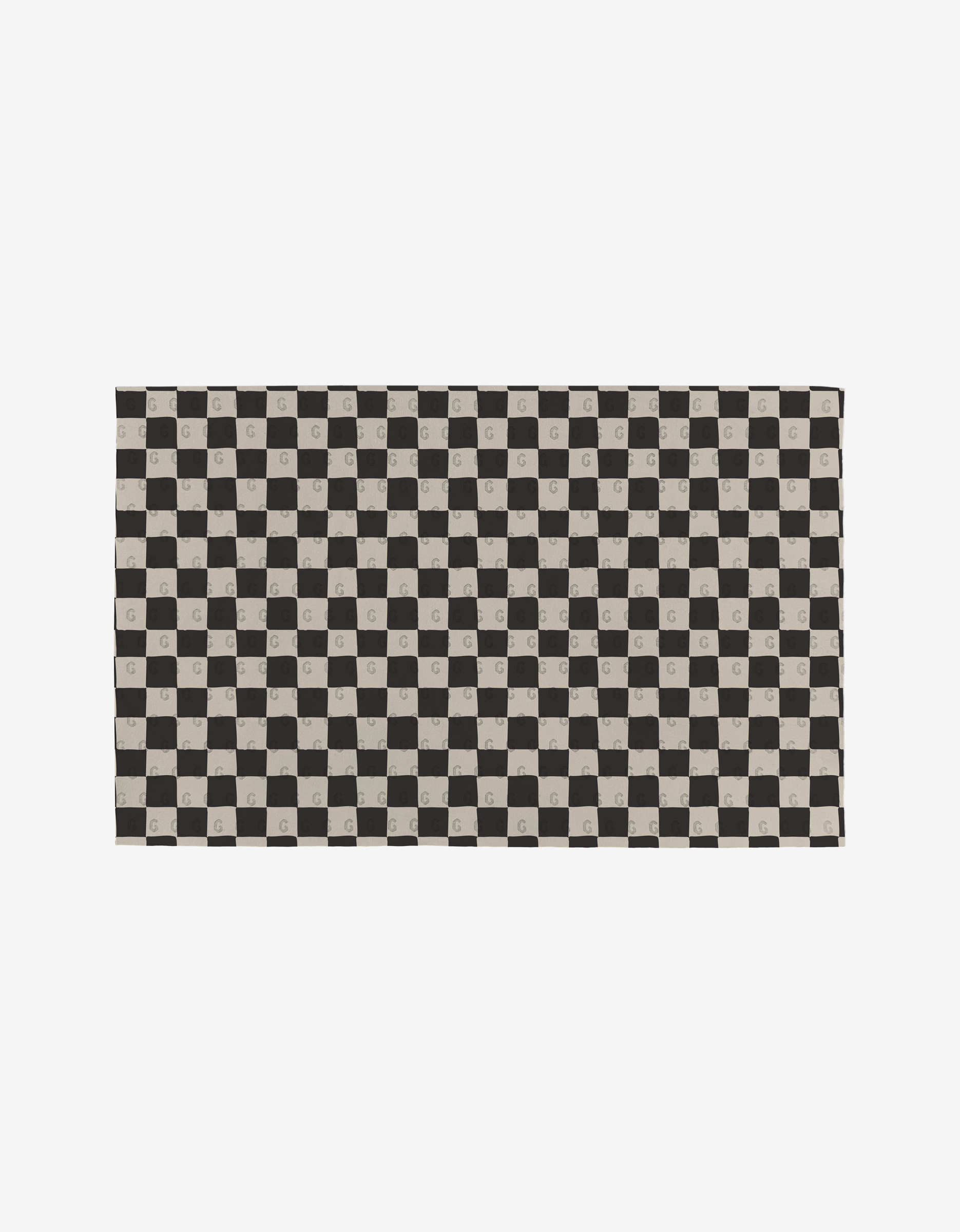 The Self Love mat by Danelys Sidron features a black and beige checkerboard pattern on eco-friendly recycled materials, with select beige squares displaying a centered G. The background is plain white.