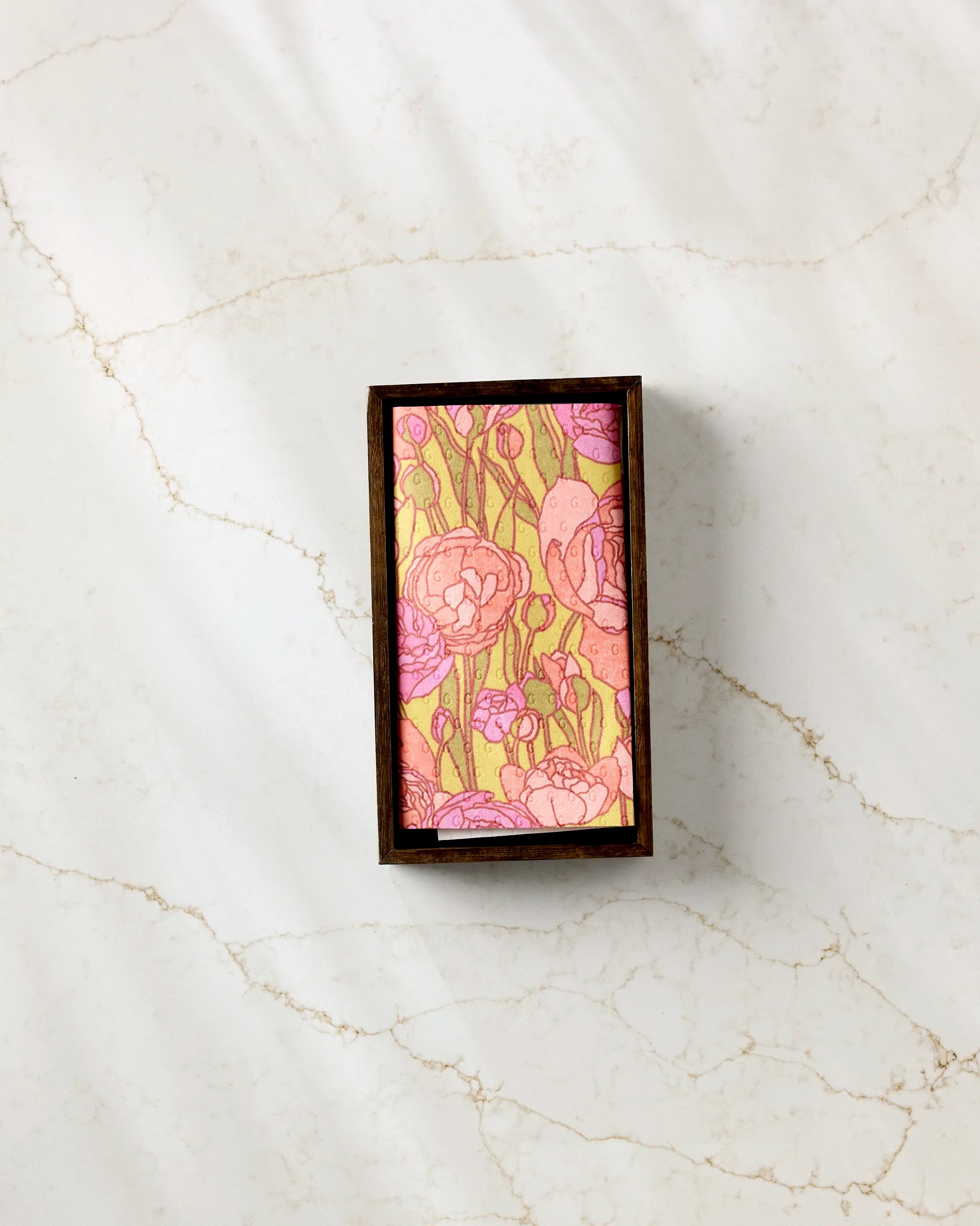 Sidney by Amy MacCready is a rectangular box with a floral-patterned lid featuring pink and peach flowers, perfect for storing reusable paper towels—an eco-friendly kitchen towel alternative.