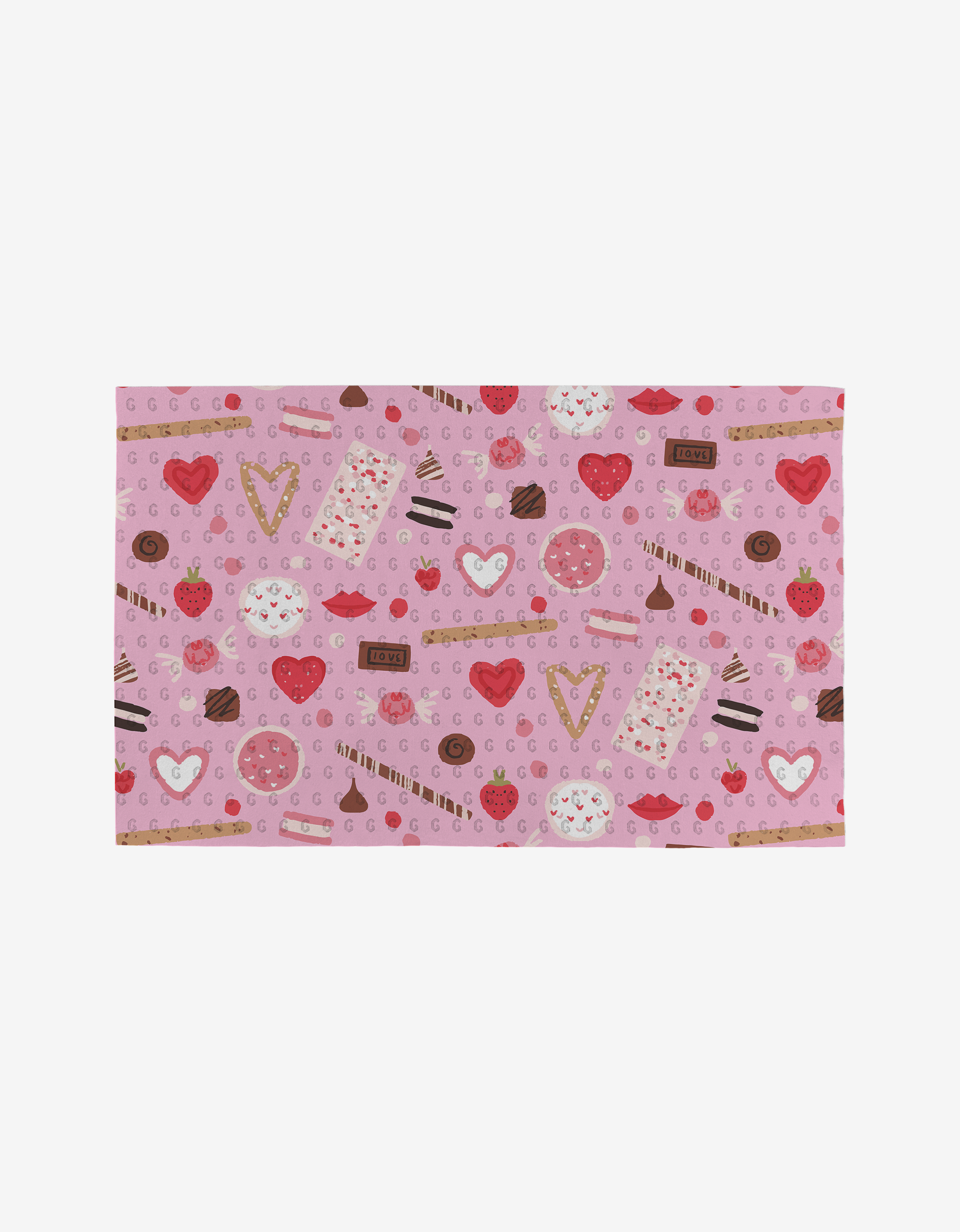 Sweet Lovin by Janna Sue Design is a rectangular mat with a pink background and cute sweets—chocolates, cookies, hearts, and strawberries—in red, brown, and white, made from eco-friendly post-consumer recycled materials.