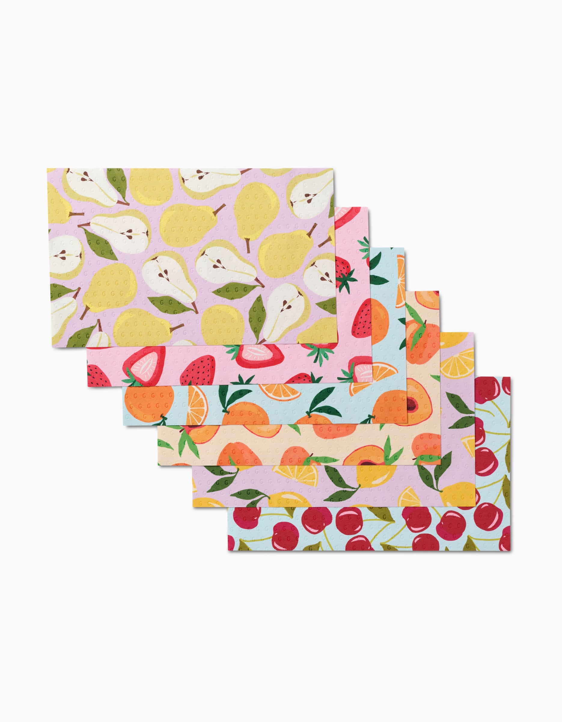 The GEOMETRY Sweet Summer Mix 1 set features six rectangular dishcloths in pastel colors, each with a vibrant fruit pattern—pears, strawberries, oranges, grapefruits, peaches, and cherries—for an eco-friendly kitchen upgrade.
