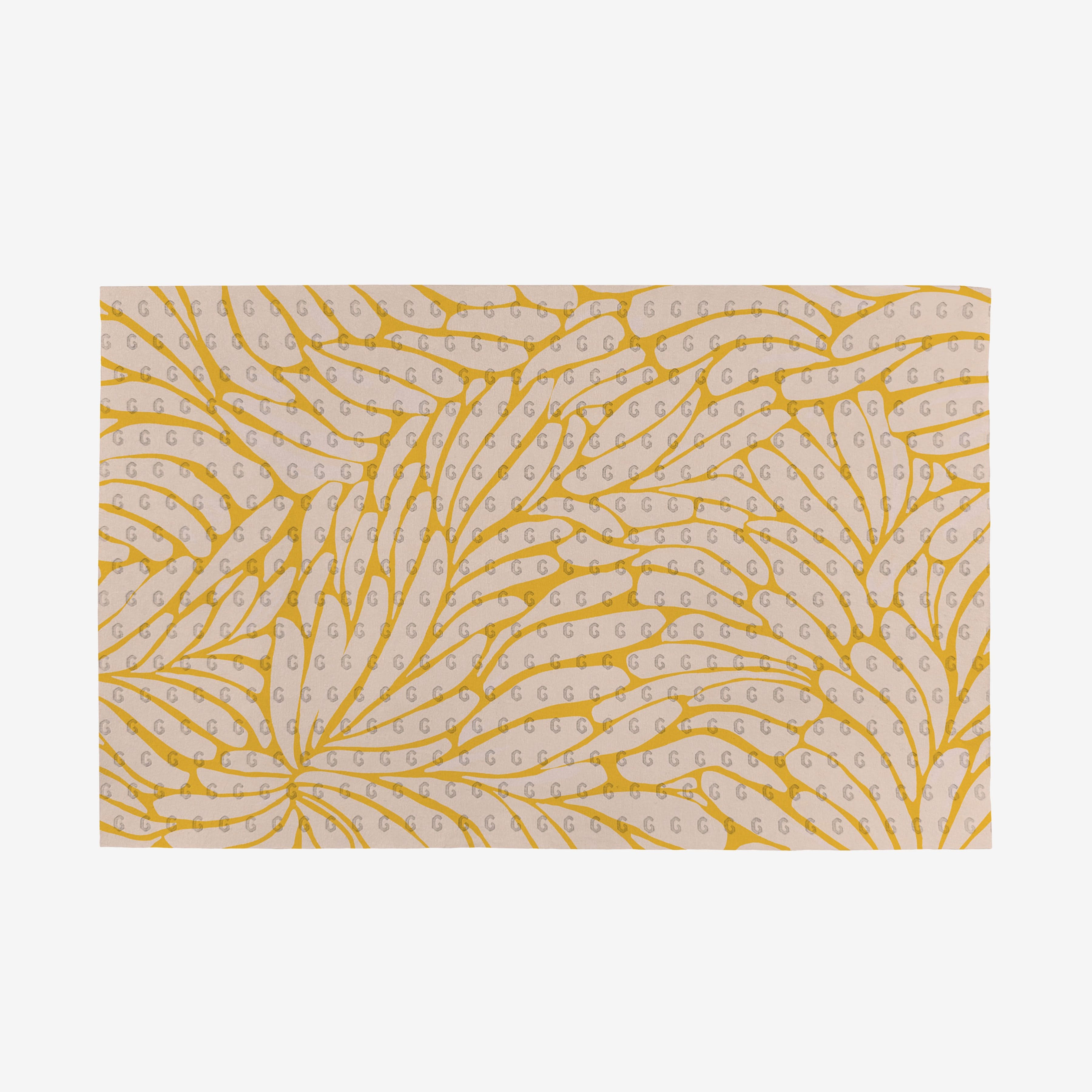 Tenderhearted by GEOMETRY features a beige background with yellow, feather-like swirls and small gray G letters, making this reusable Not Paper Towels design both stylish and eco-friendly.