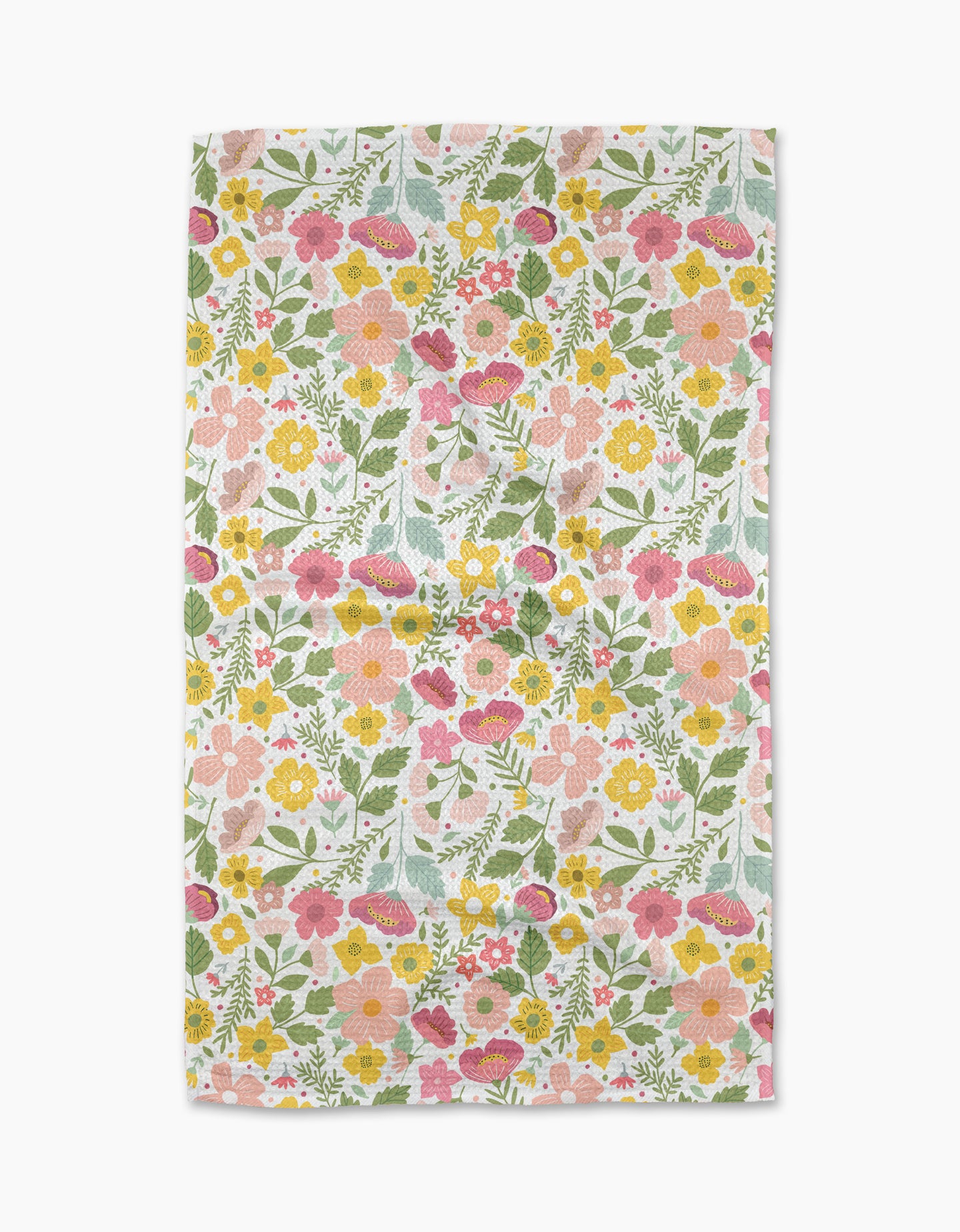 Blooming Days by Cottonflower Studio is a rectangular recycled kitchen towel with a vibrant, dense floral print—pink, yellow, and orange flowers with green leaves on white—covering the entire fabric.