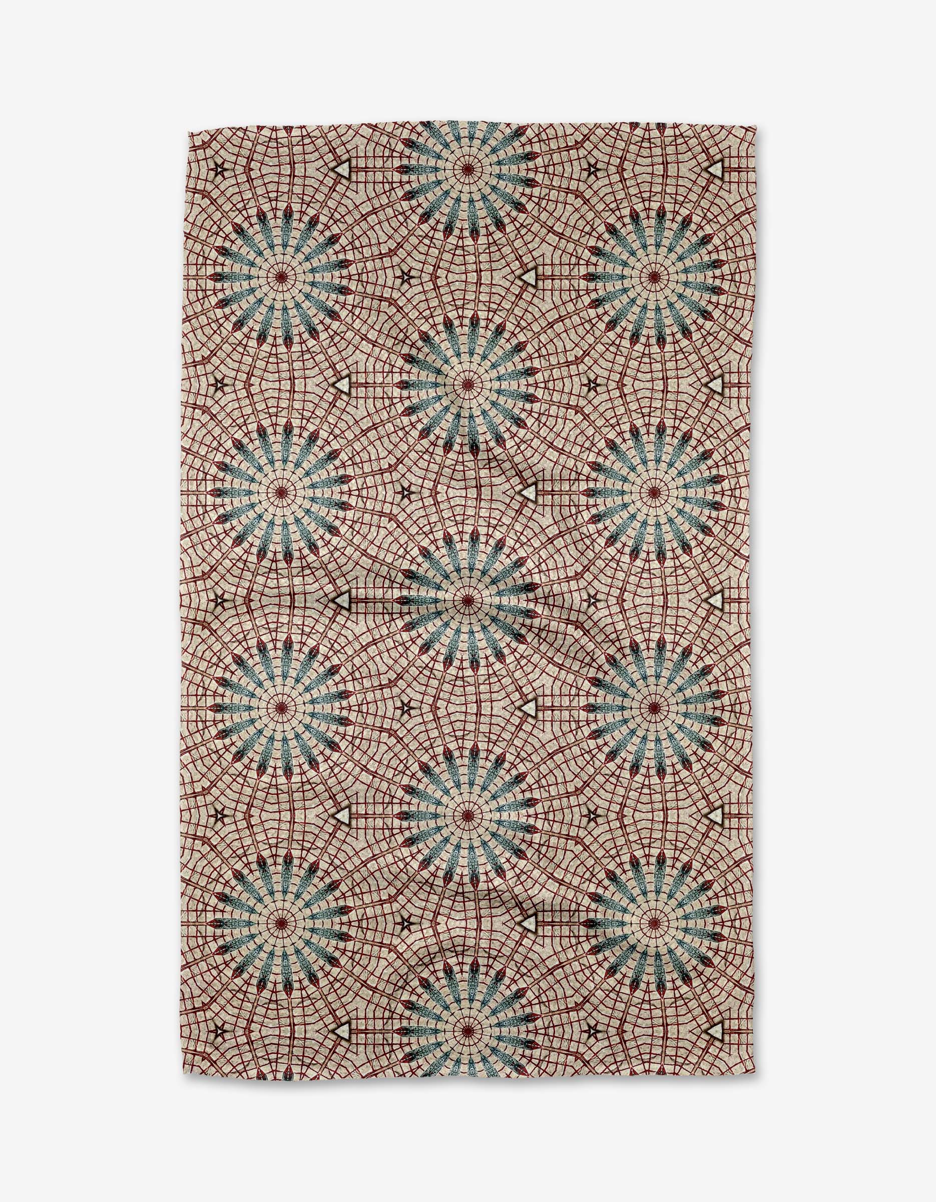 The Blue Aster Foxtrot by Katherine Berkeley is a rectangular rug with blue, green, and red starburst circles linked by red lines on a cream background. Crafted from recycled materials, its repeating geometric pattern adds artistic flair.