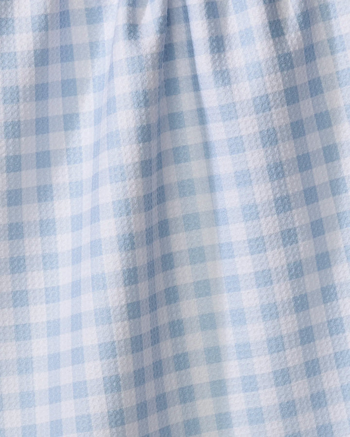 Blue Gingham by Aubrey Fairchild features light blue and white Geoweave fabric in a classic gingham pattern. Soft, subtly textured, and slightly gathered at the top, this stylish yet practical material is ideal for garments or tea towels.