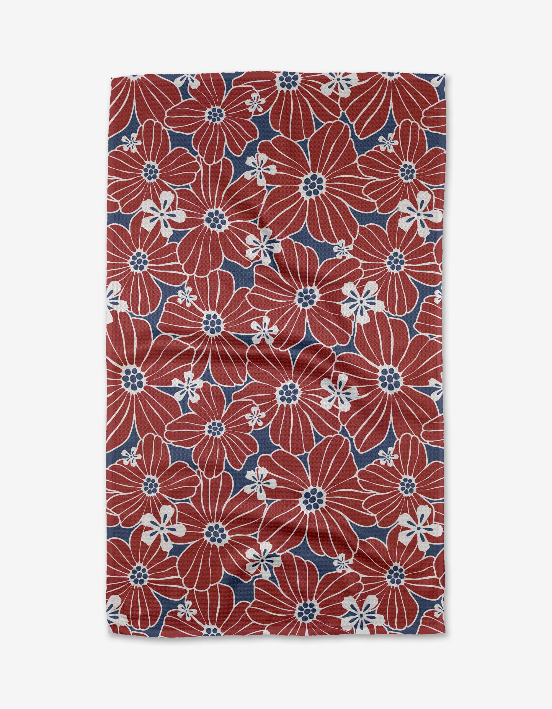 The Ashley Celena Botanical Blush Tea Towel is crafted from Geoweave™ fabric and features large red flowers with smaller white flowers with blue centers on a blue background, beautifully laid flat to display the vibrant floral design.