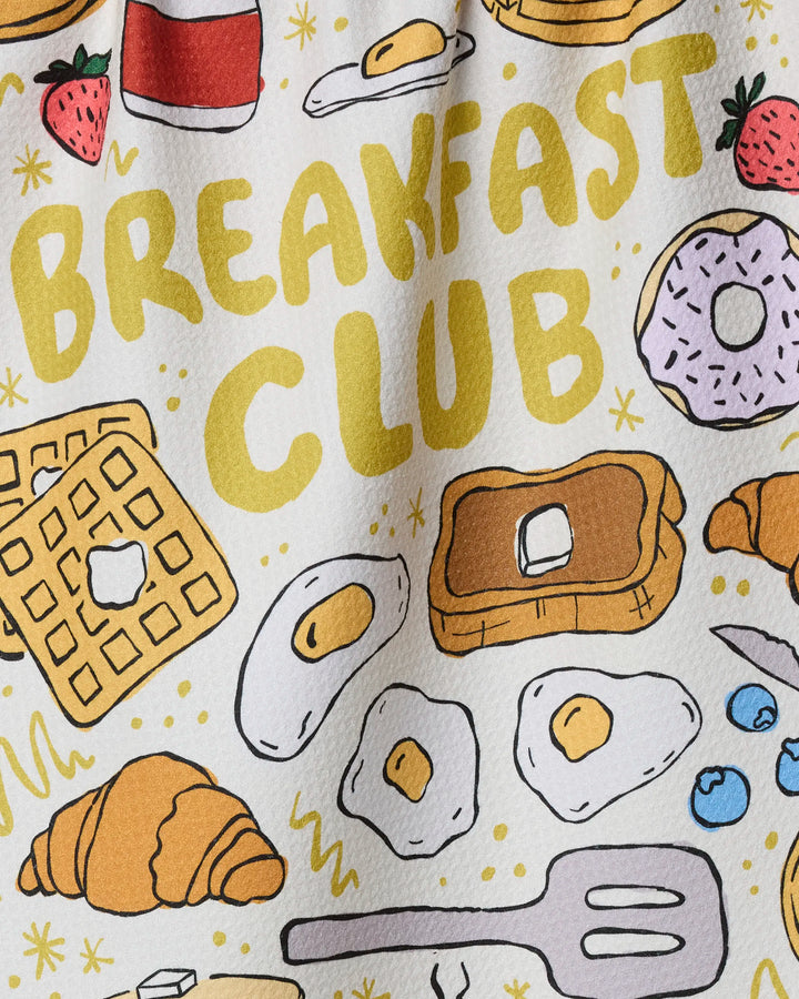 The Rosa Kichline "Breakfast Club" dish towel is illustrated with breakfast favorites and text, making it a fun and absorbent addition that brightens up your kitchen.