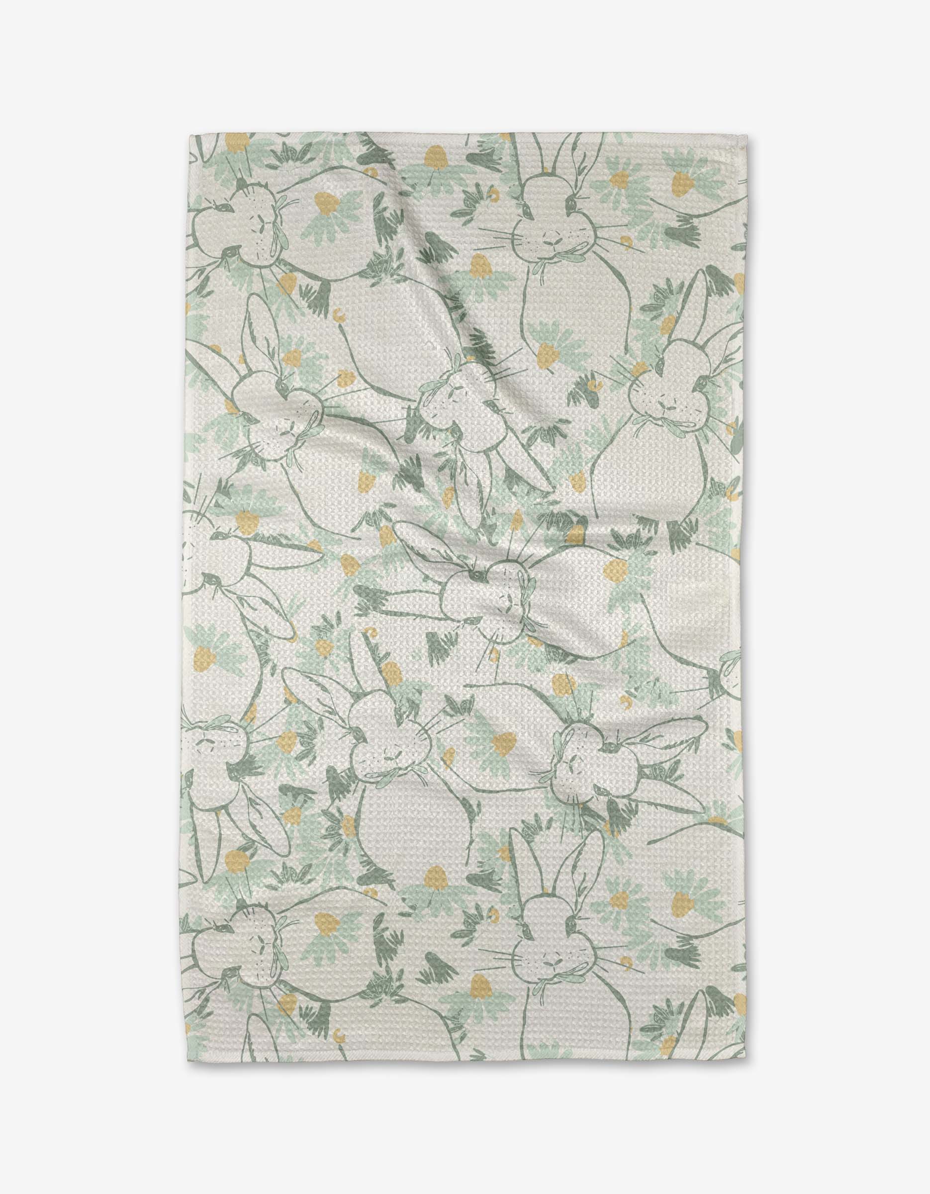 Second Nature Studio’s Bunny Tea Time is a soft Geoweave tea towel featuring outlined bunnies and yellow flowers on a light background. The playful, scattered bunny pattern offers both charm and extra absorbency.