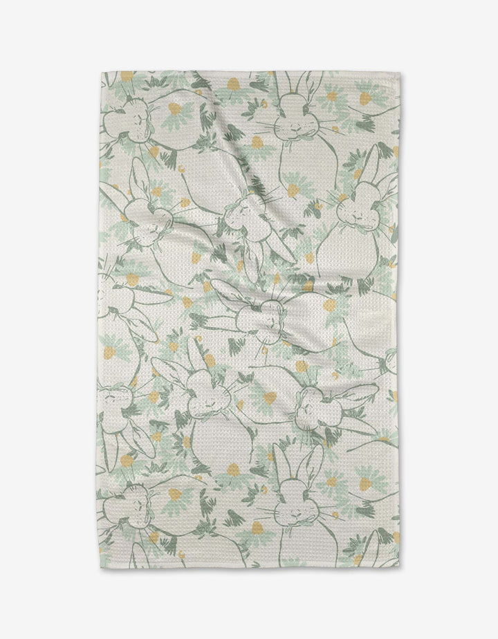 Second Nature Studio’s Bunny Tea Time is a soft Geoweave tea towel featuring outlined bunnies and yellow flowers on a light background. The playful, scattered bunny pattern offers both charm and extra absorbency.