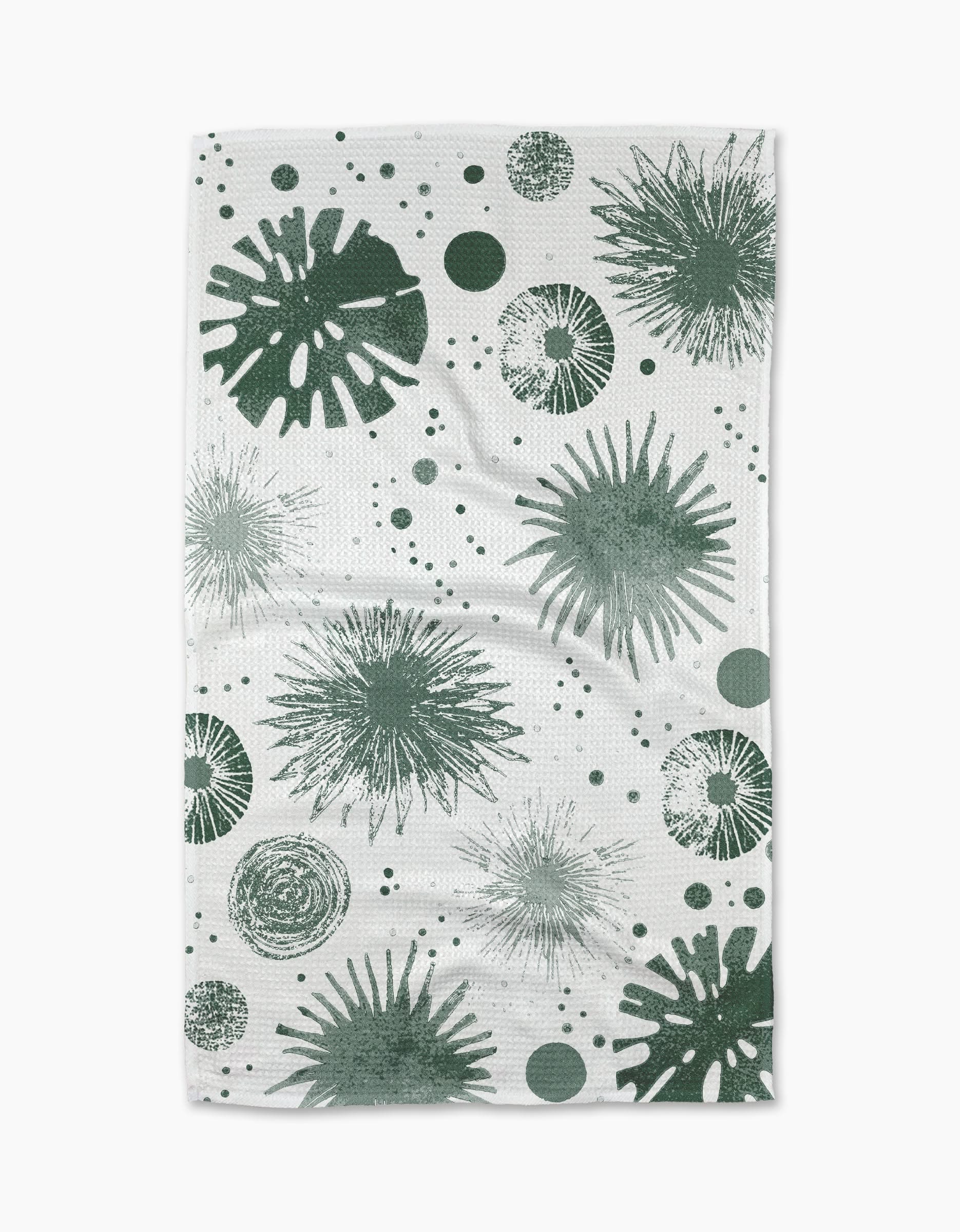 Geometrys Bursting Skies Green Tea Towel showcases starbursts, circles, and dots in green on ultra-absorbent Geoweave fabric, blending modern style with everyday function.