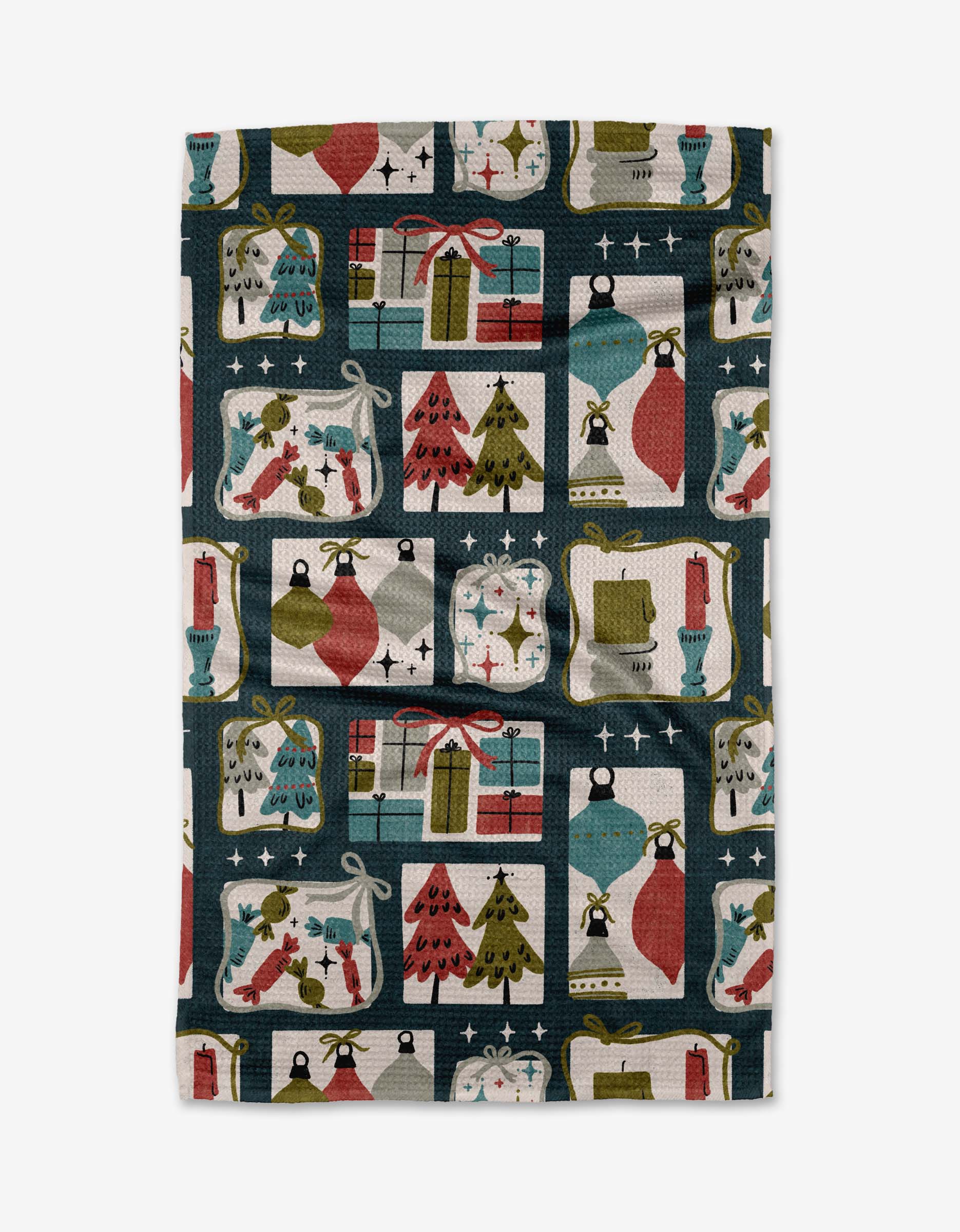 The Cady Dark Tea Towel by Amy MacCready features a vibrant pattern of gifts, trees, stockings, and ornaments on a dark background, crafted from durable Geoweave™ fabric for lasting color and detail.