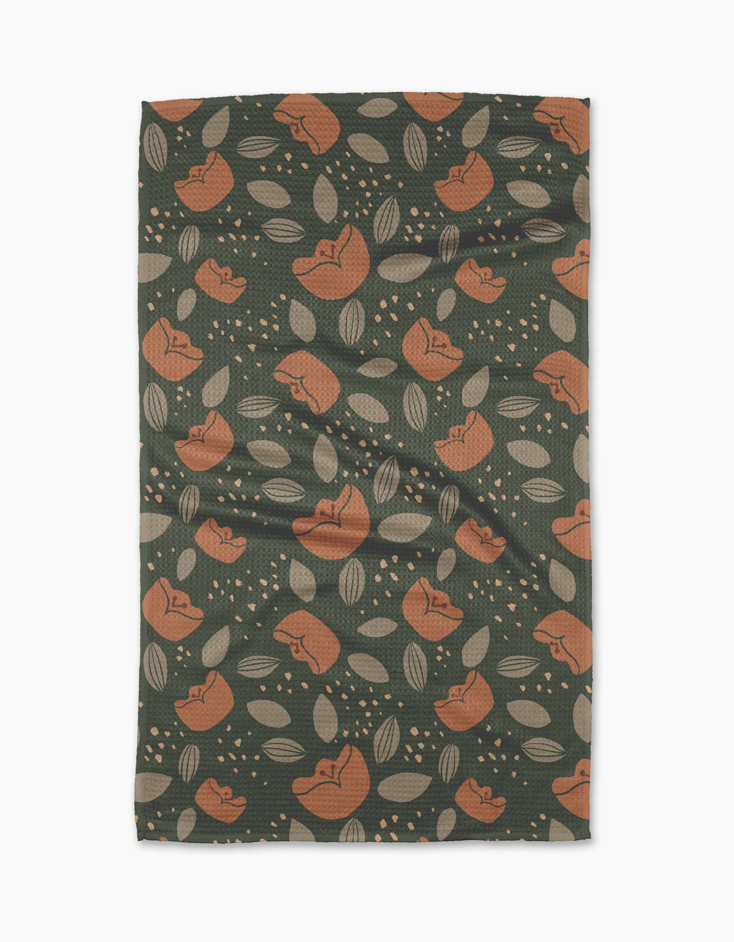 Cali Sun by Amberleigh Adoff features a dark green background with orange flowers, beige leaves, and dots. This ultra-absorbent, slightly textured towel is stylish and functional—perfect for any kitchen.